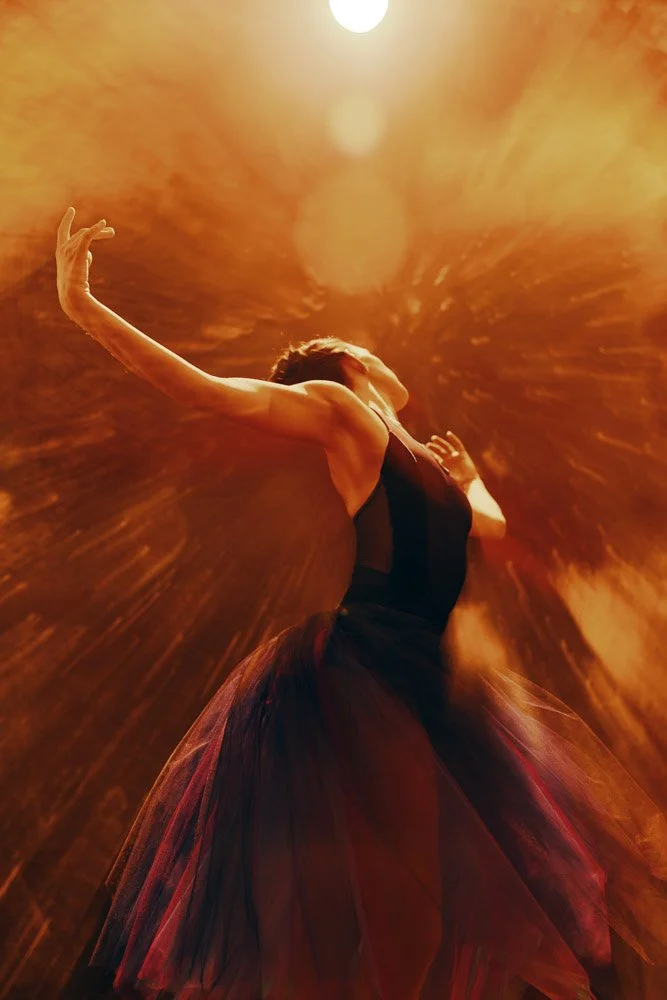 Dance portrait lit with dramatic studio lighting