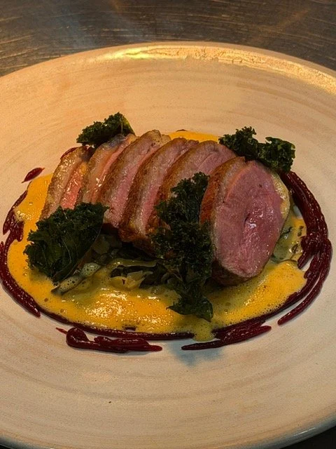 Skeaghmore Duck breast, beetroot cherry gel with roasted cabbage garnish and crispy kale