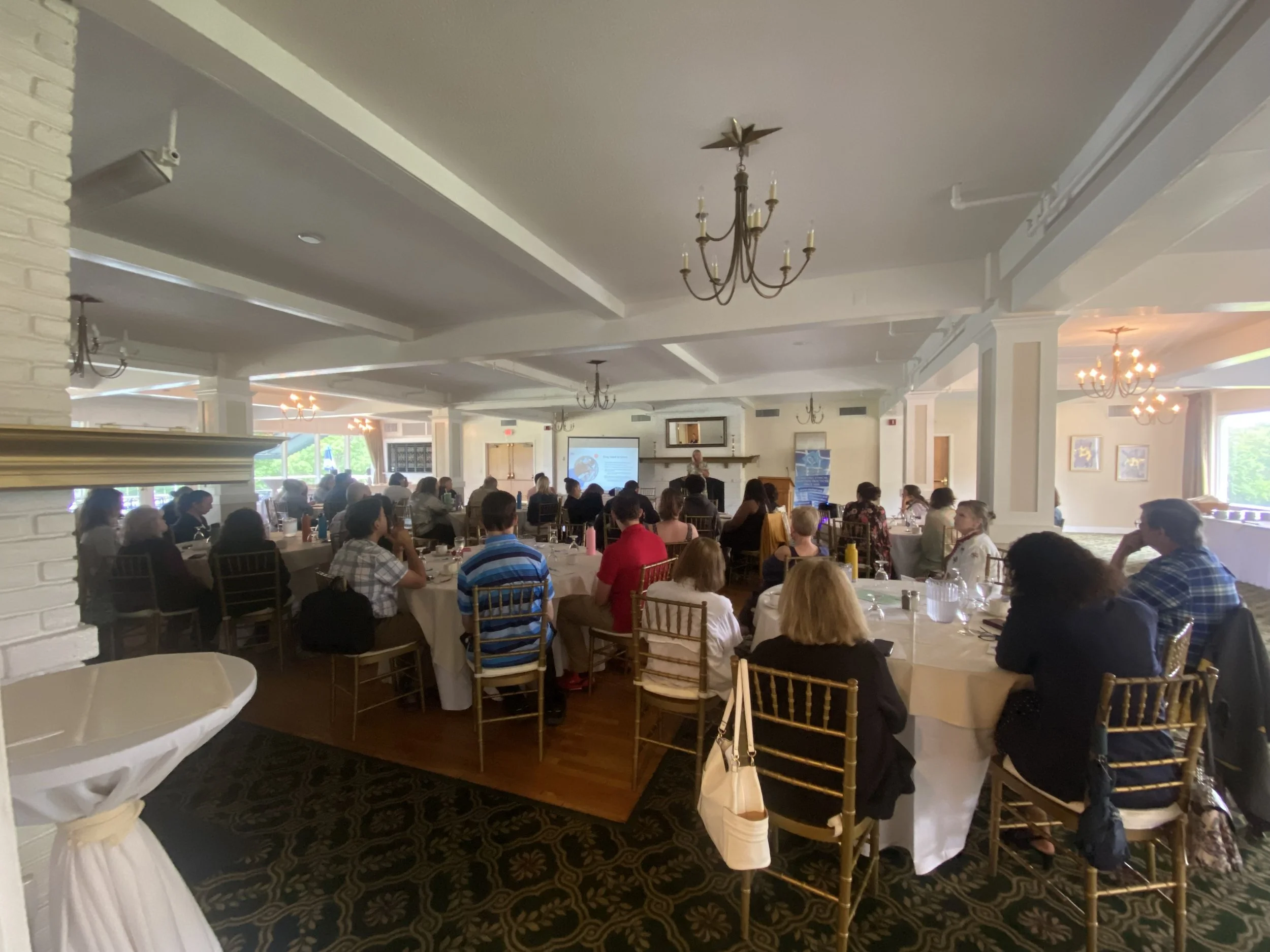  Group shot of room and attendees 
