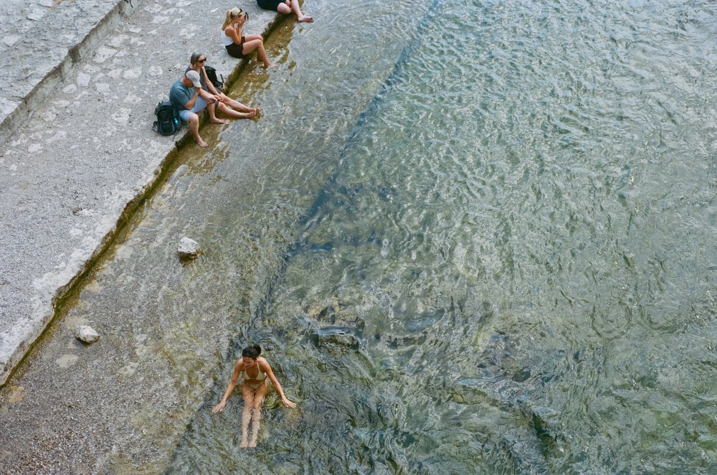 Landscapes of Bavaria.

A 15 minute walk from the center of Munich is the Isar river, where people wade and swim to cool off in the summer heat. Spending the afternoon in these clear and clean water made me fall in love with Munich.

All images shot 