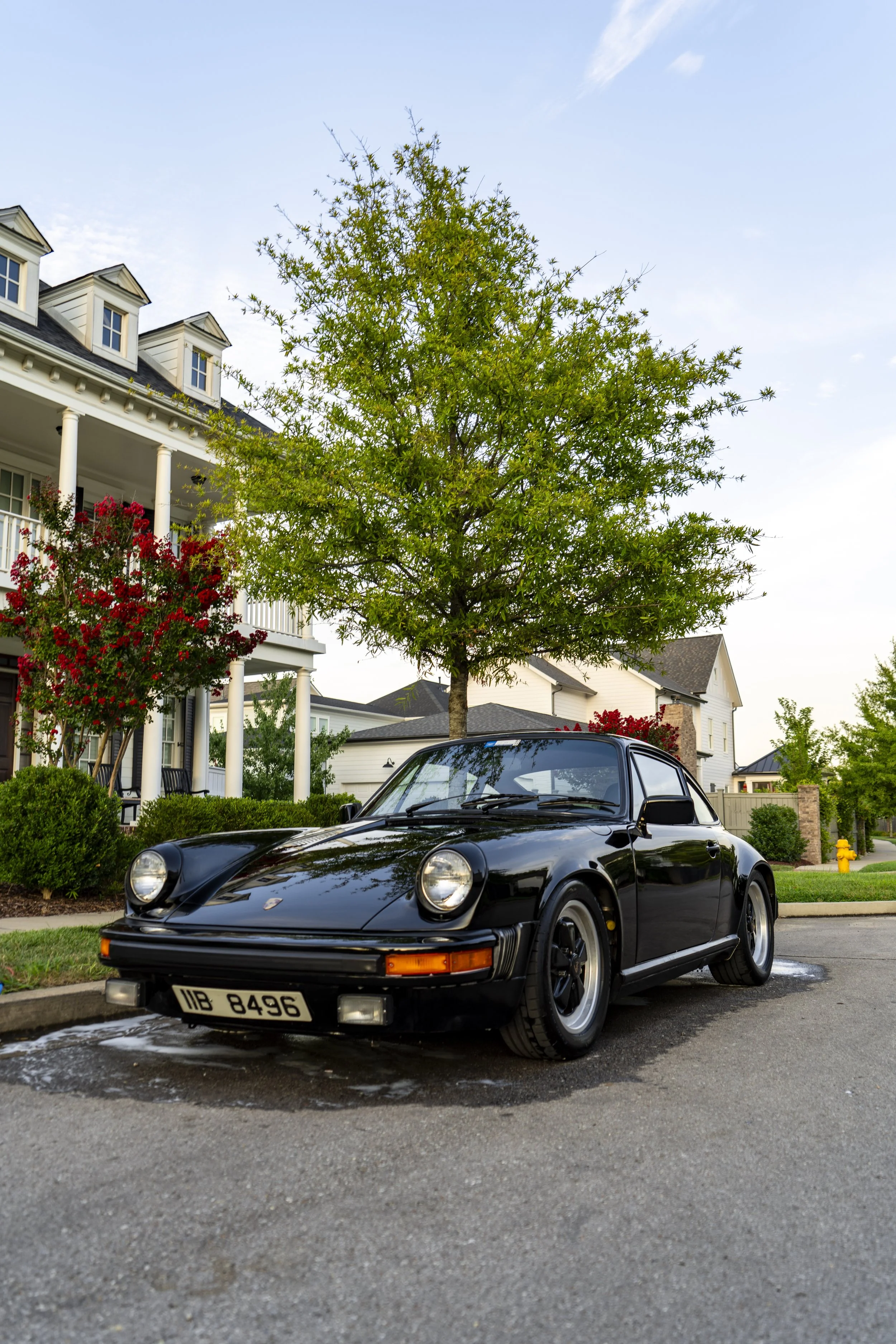 Fully detailed black vintage Porsche 911 by Reflections Perfection — premium exterior car detailing service in Franklin, TN.