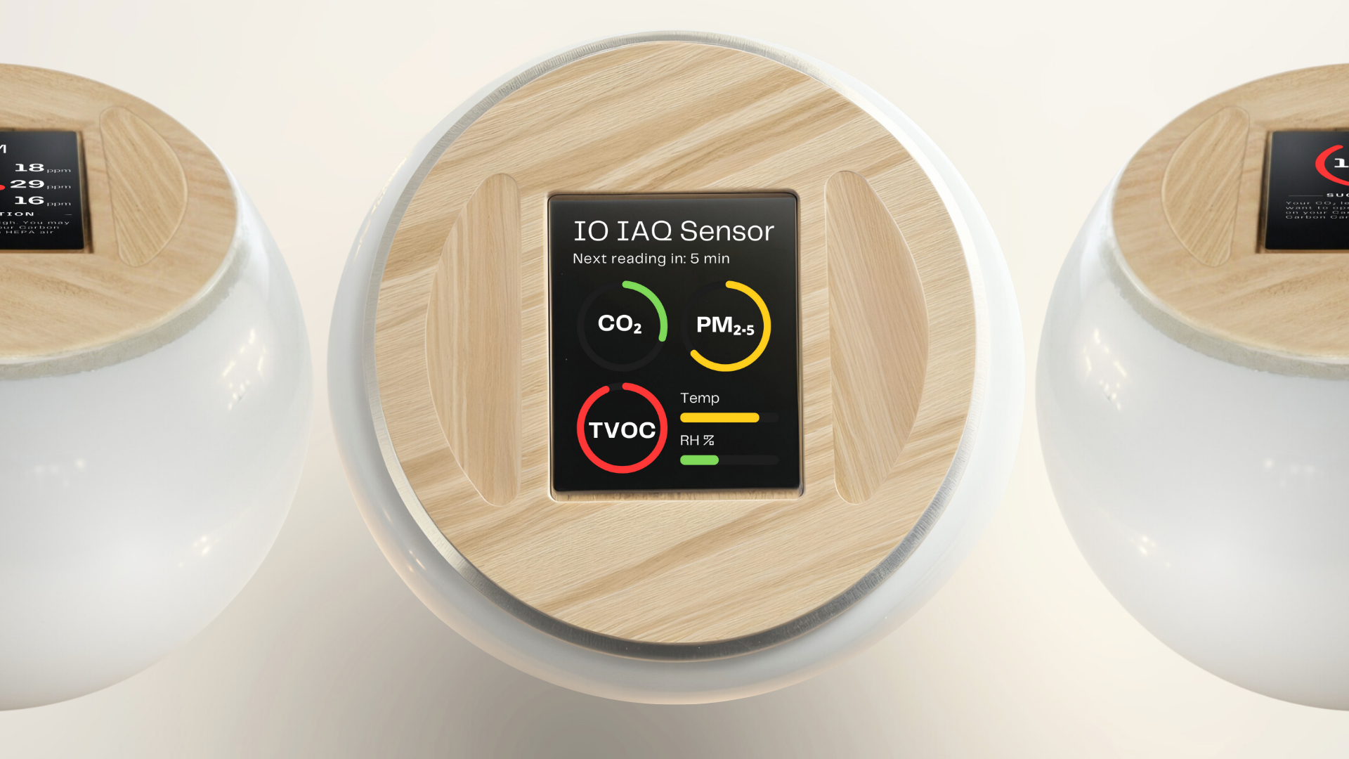 Smart air quality sensor device with a digital display showing levels of CO2, PM2.5, TVOC, temperature, and humidity, surrounded by two white spherical air purifiers.