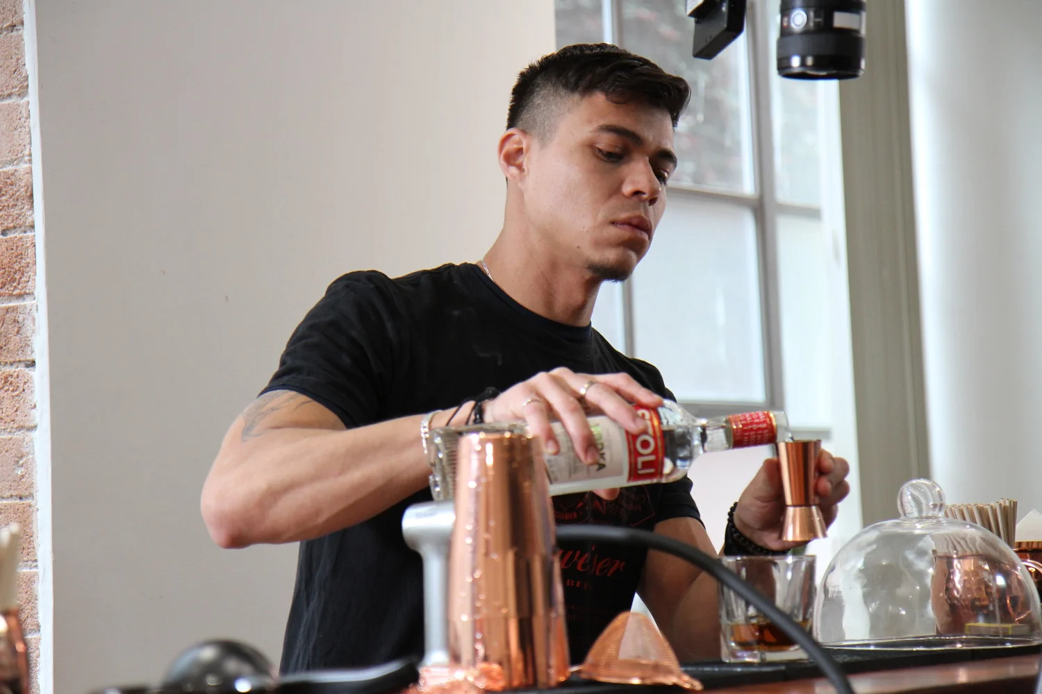 Hoochin bartender preparing cocktails at a corporate event