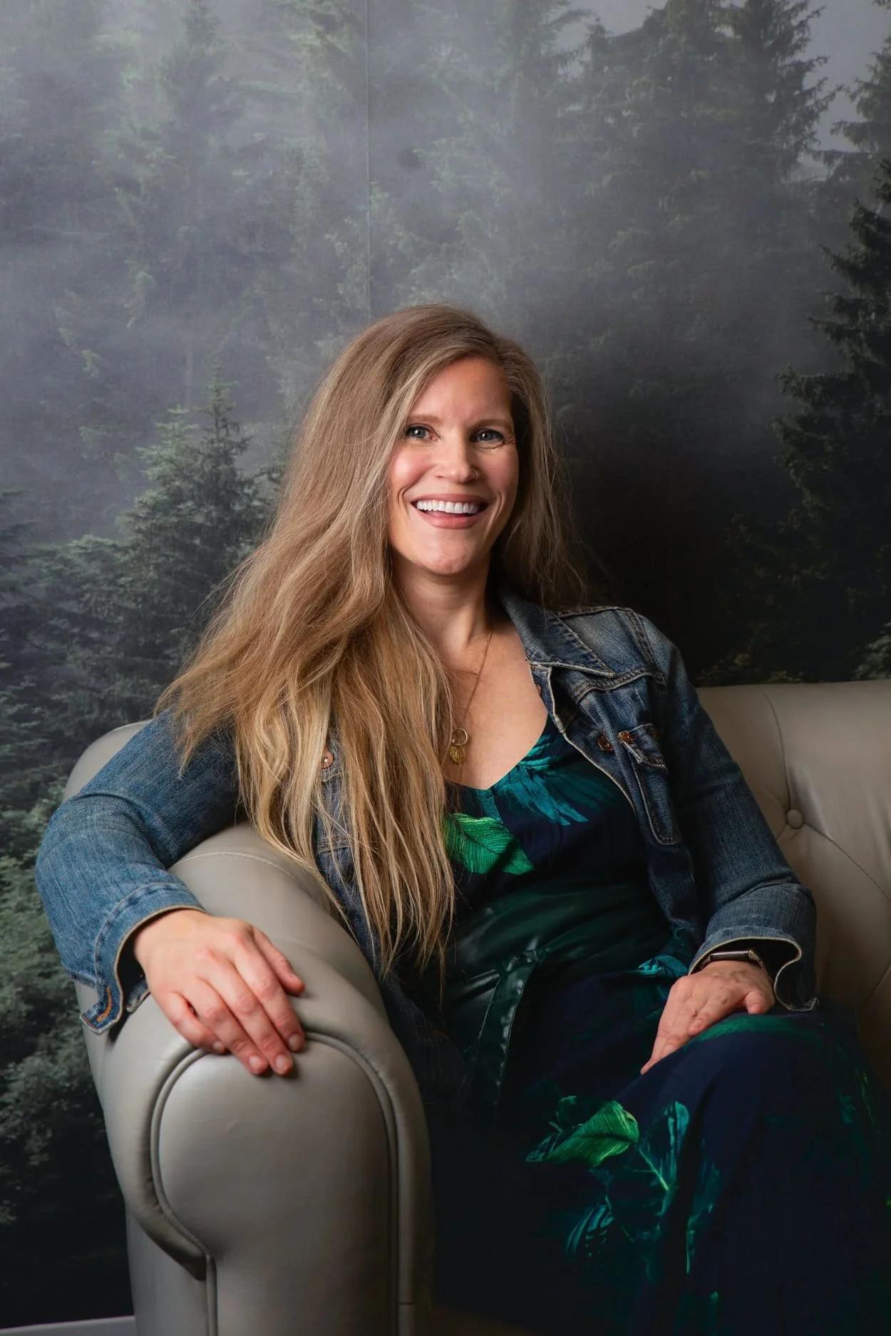Anna Neale, Registered Provisional Psychologist at Psychology in the Park, seated on a couch