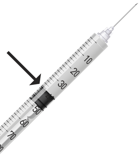 Arrow pointing to where to read your measurement when drawing with an insulin syringe.