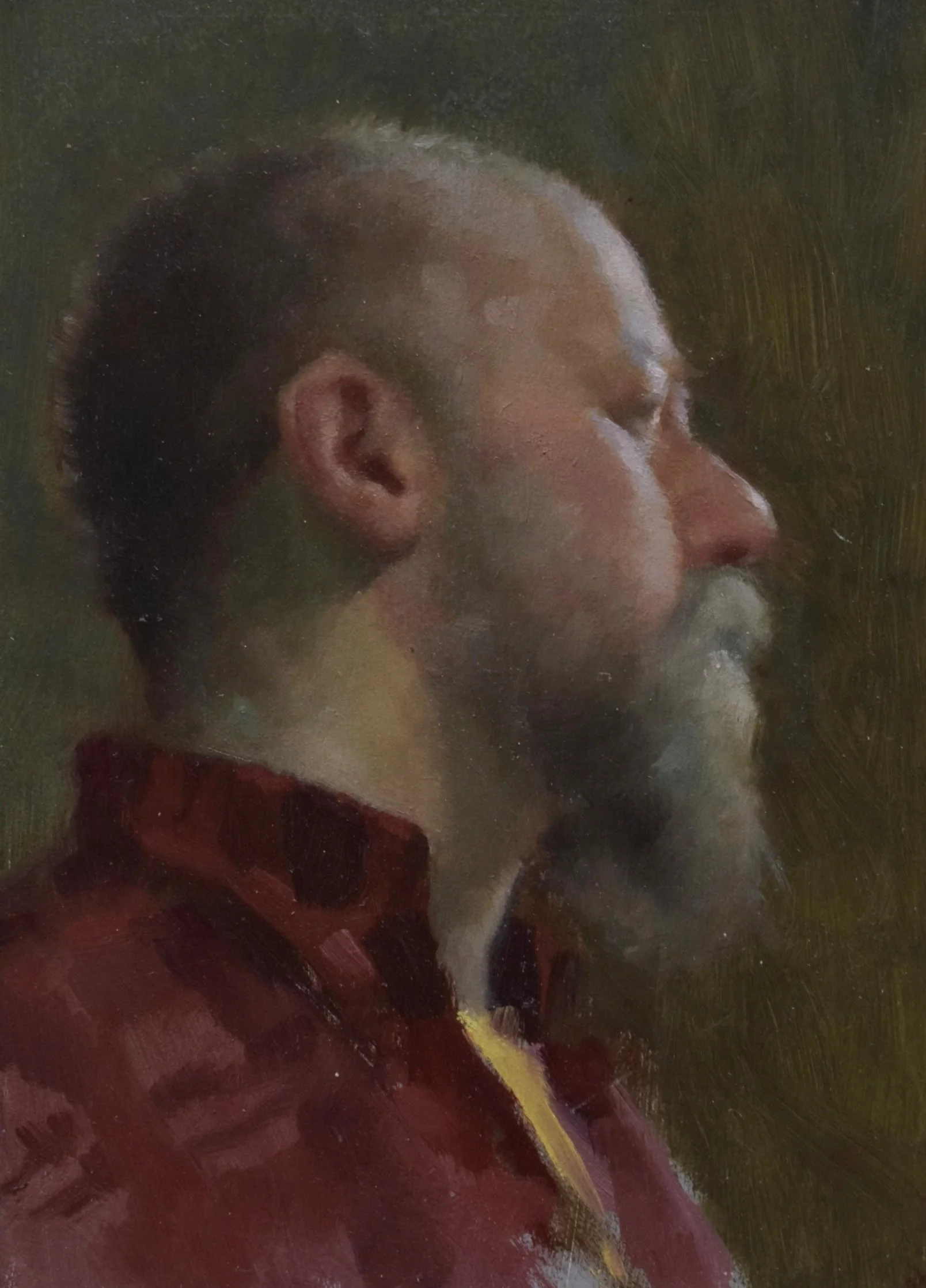 A detailed oil painting of a man with a beard and mustache, viewed in profile, wearing a red garment with a yellow stripe.