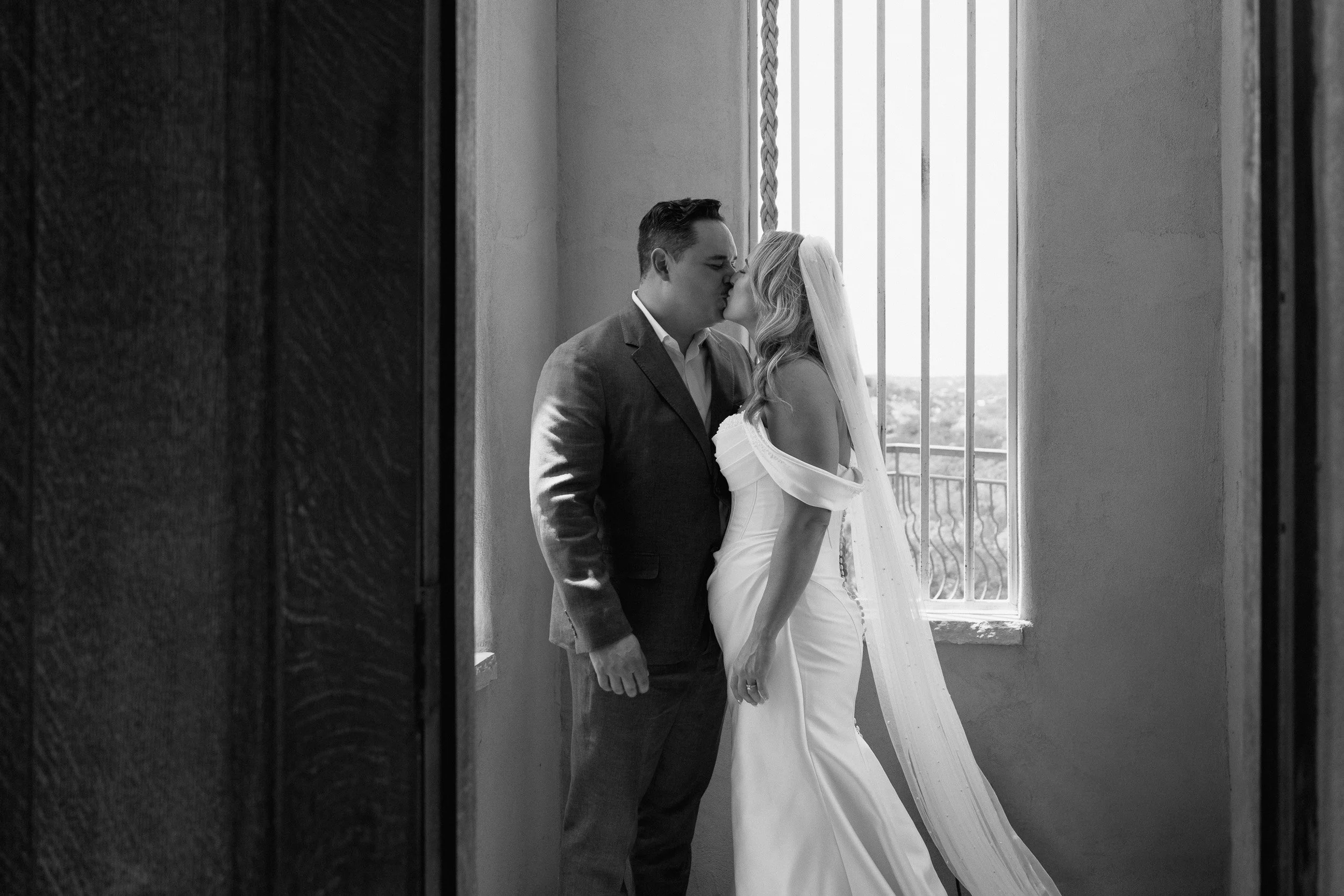 bell-tower-window-kiss-black-and-white.jpg