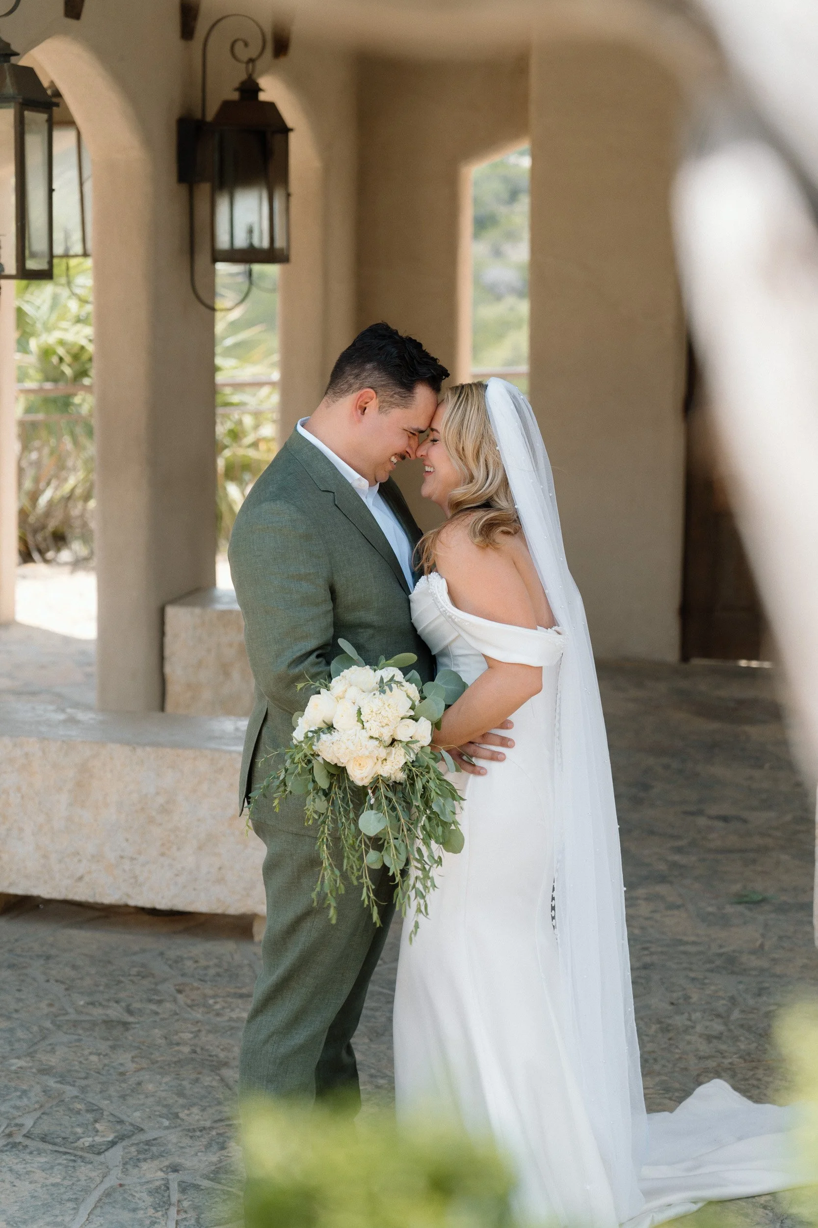 chapel-dulcinea-couple-arches-portrait.jpg
