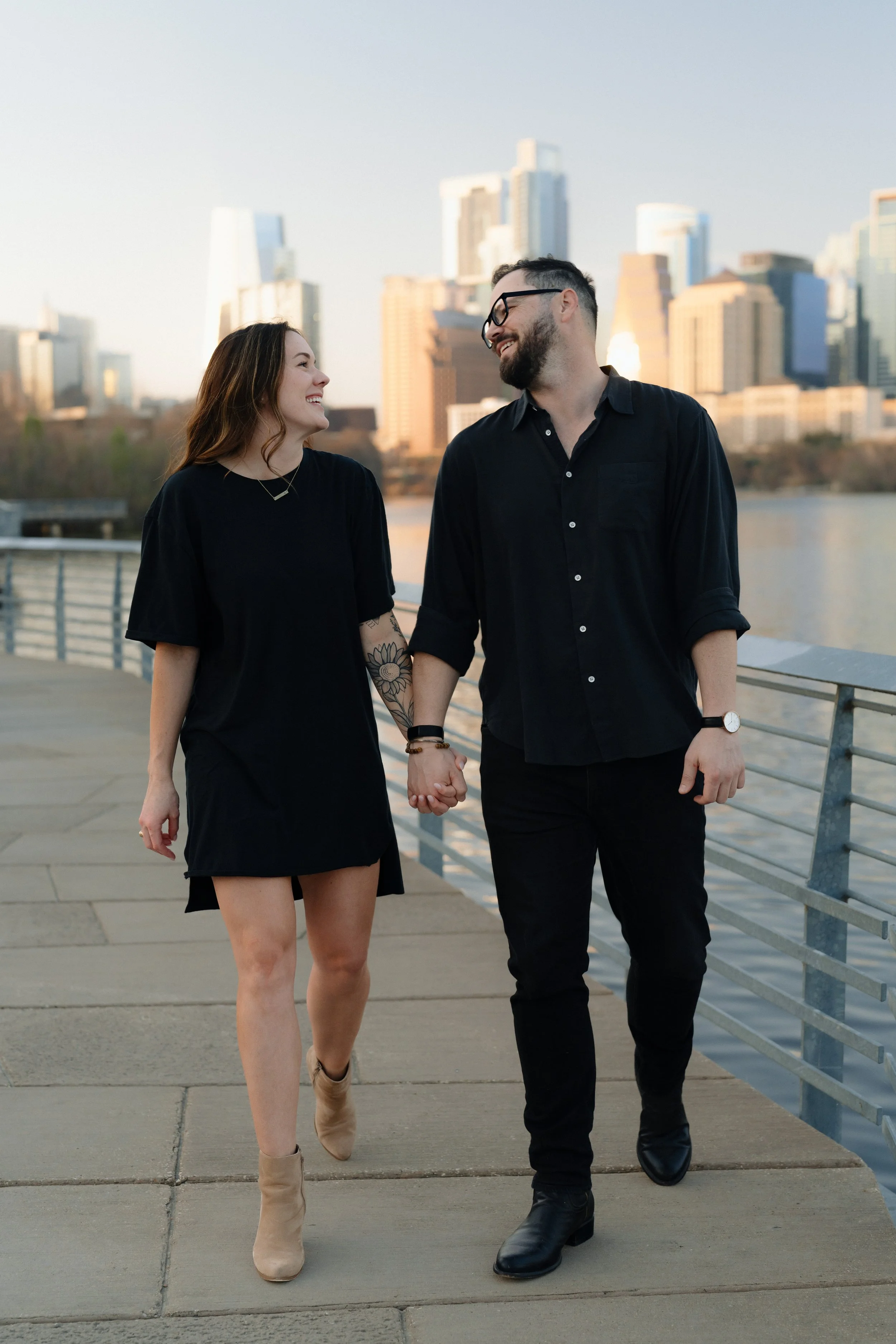 Couple take engagement photos by Austin wedding photographer at Lady Bird Lake