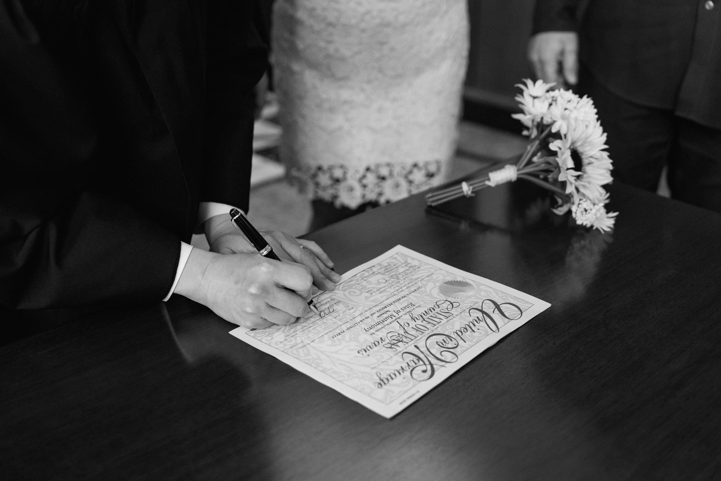 Bride and groom getting married at the Austin courthouse