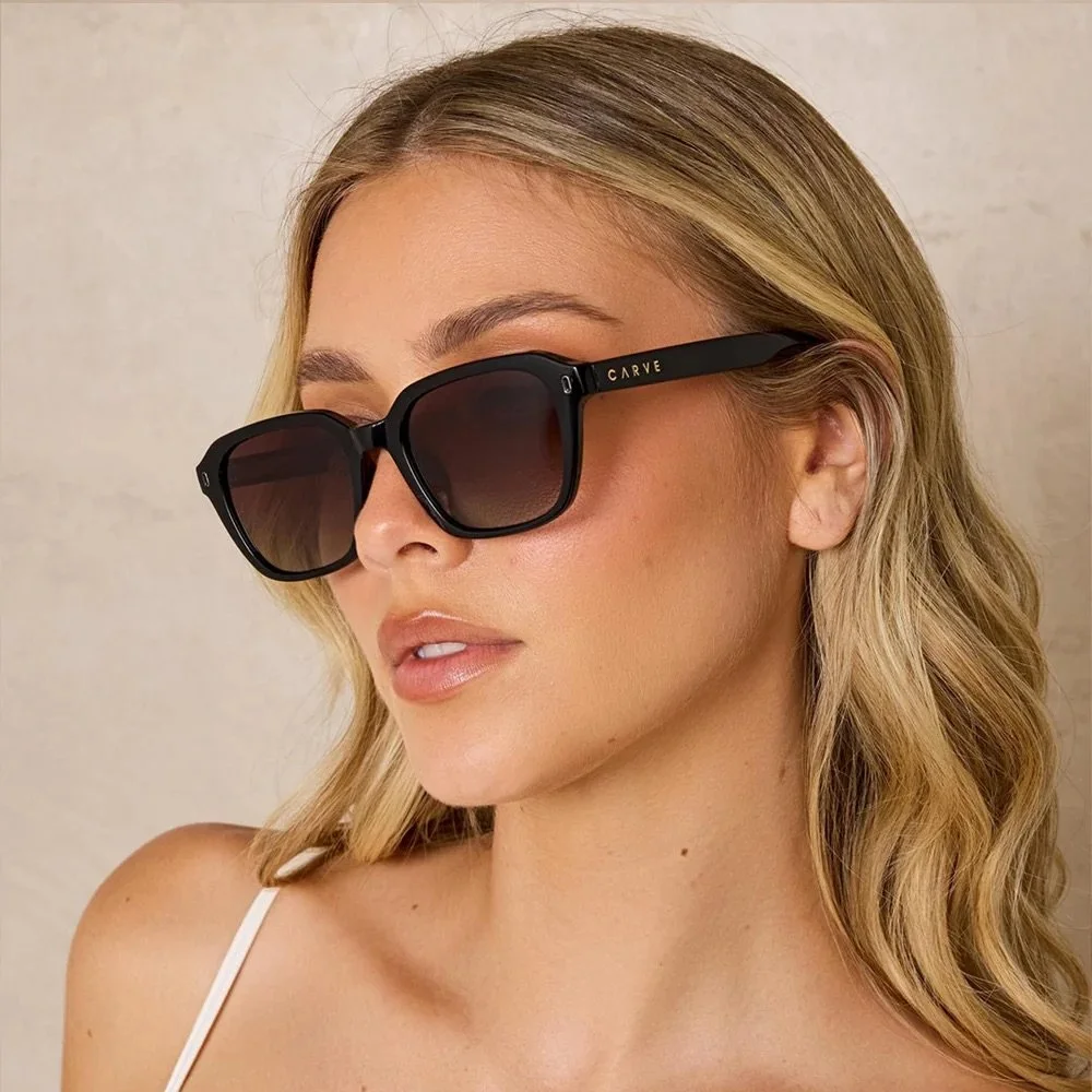 A women modeling Carve Eyewear Manhattan glasses 