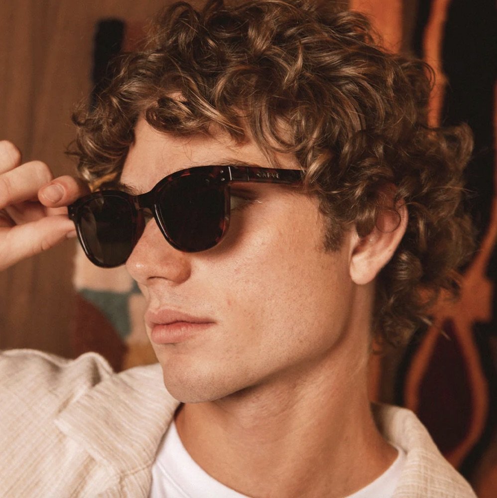 A man posing with Homeland sunglasses from Carve Eyewear 