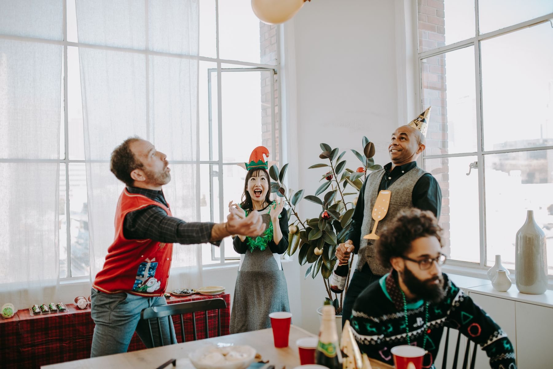 Holiday party with candy cane balloons