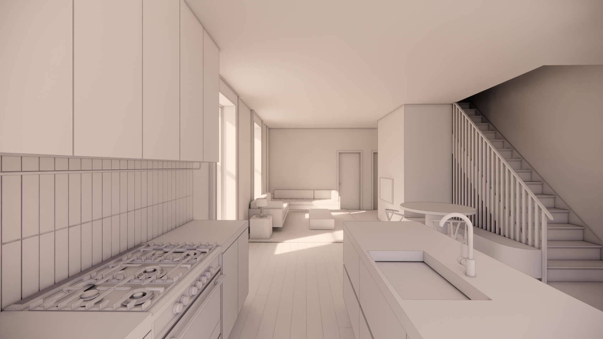 Empty modern kitchen and living room space in neutral tones, with white cabinets, stovetop, sink, and staircase leading to upper level.
