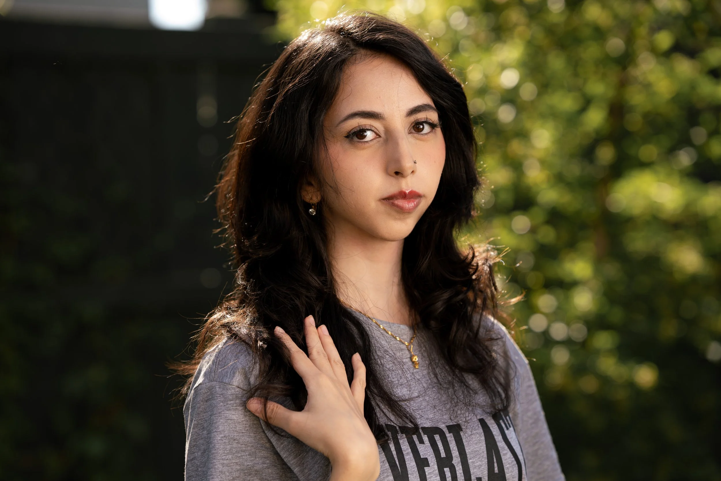 A woman posing for camera for portrait shot