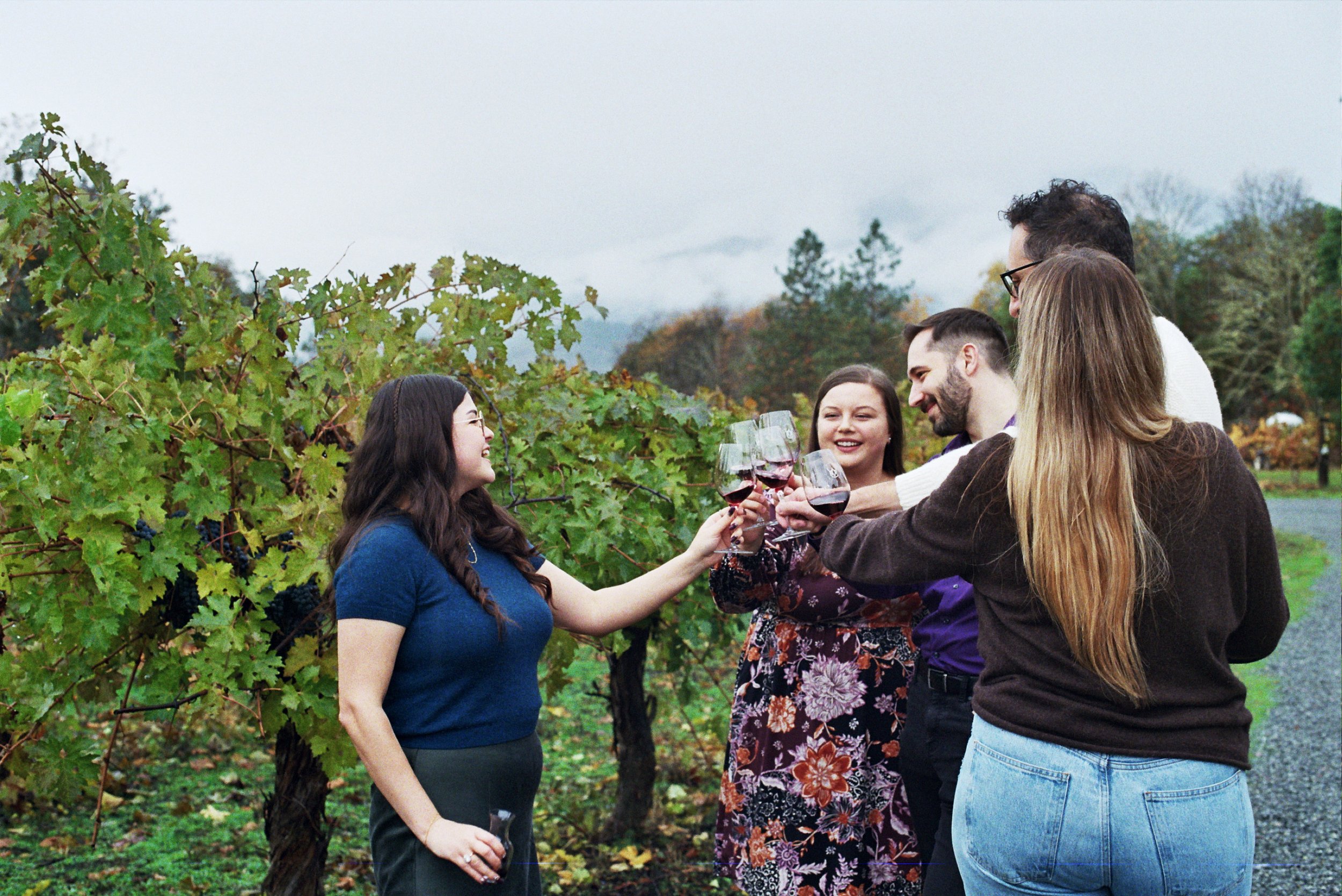 Guests enjoying a relaxed Applegate Valley wine tasting at a small family-owned winery in applegate oregon