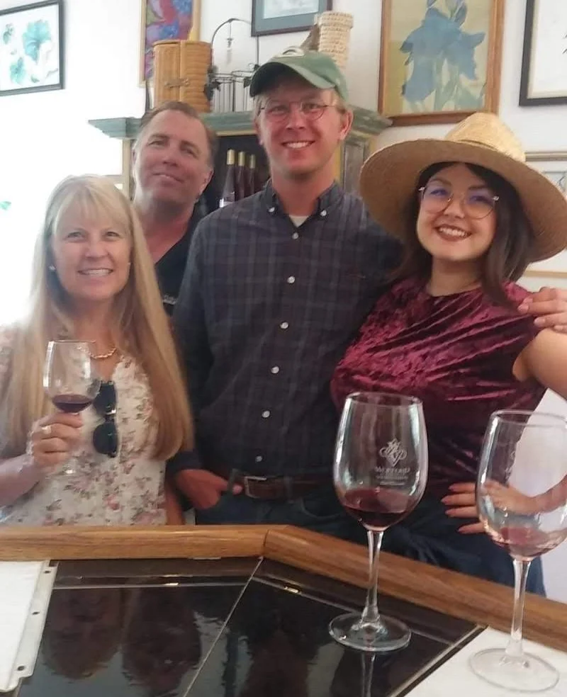 Faith at a wine tasting with her family, exploring Southern oregon wine country