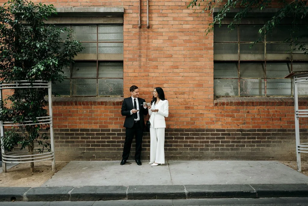 Bride and groom share a coffee