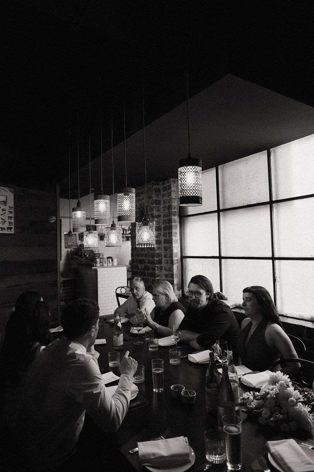 candid black and white moment lunch