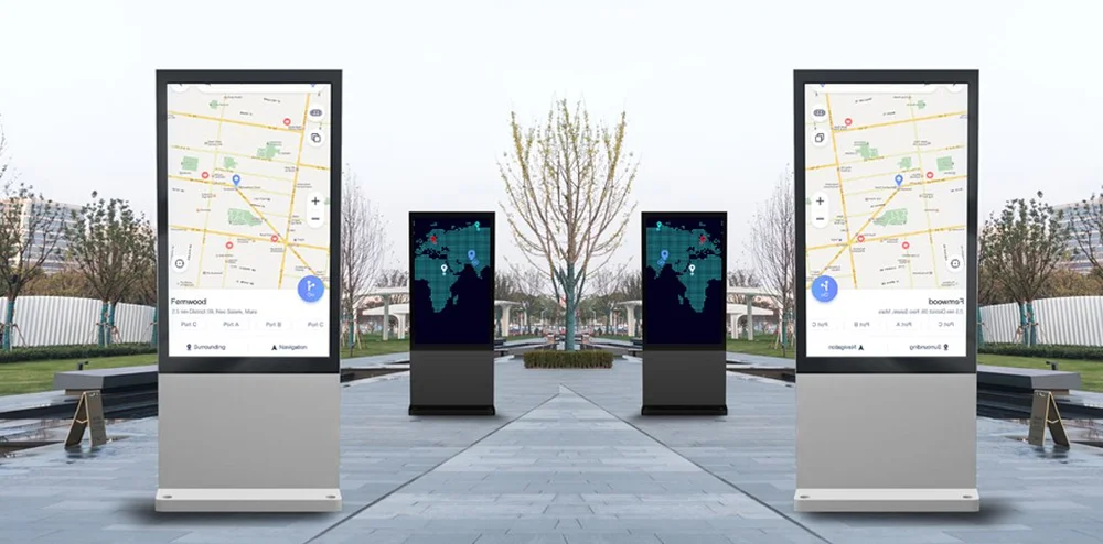 Fanless outdoor totems displaying wayfinding maps in a public plaza