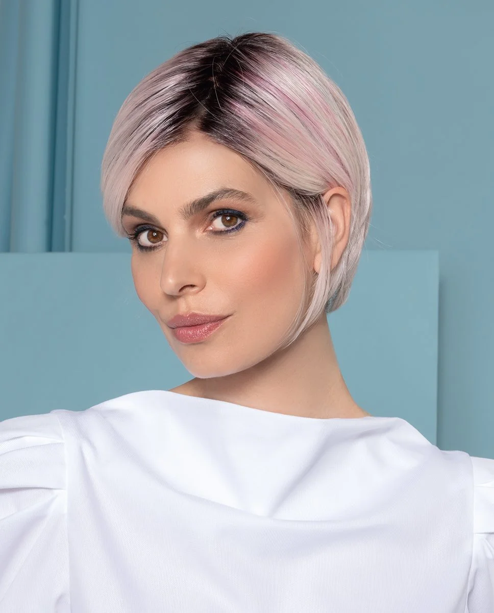 Short pastel pink and blonde wig with modern cropped style