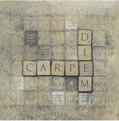 Scrabble tiles spelling 'CARPE' and 'DIEM' on a game board