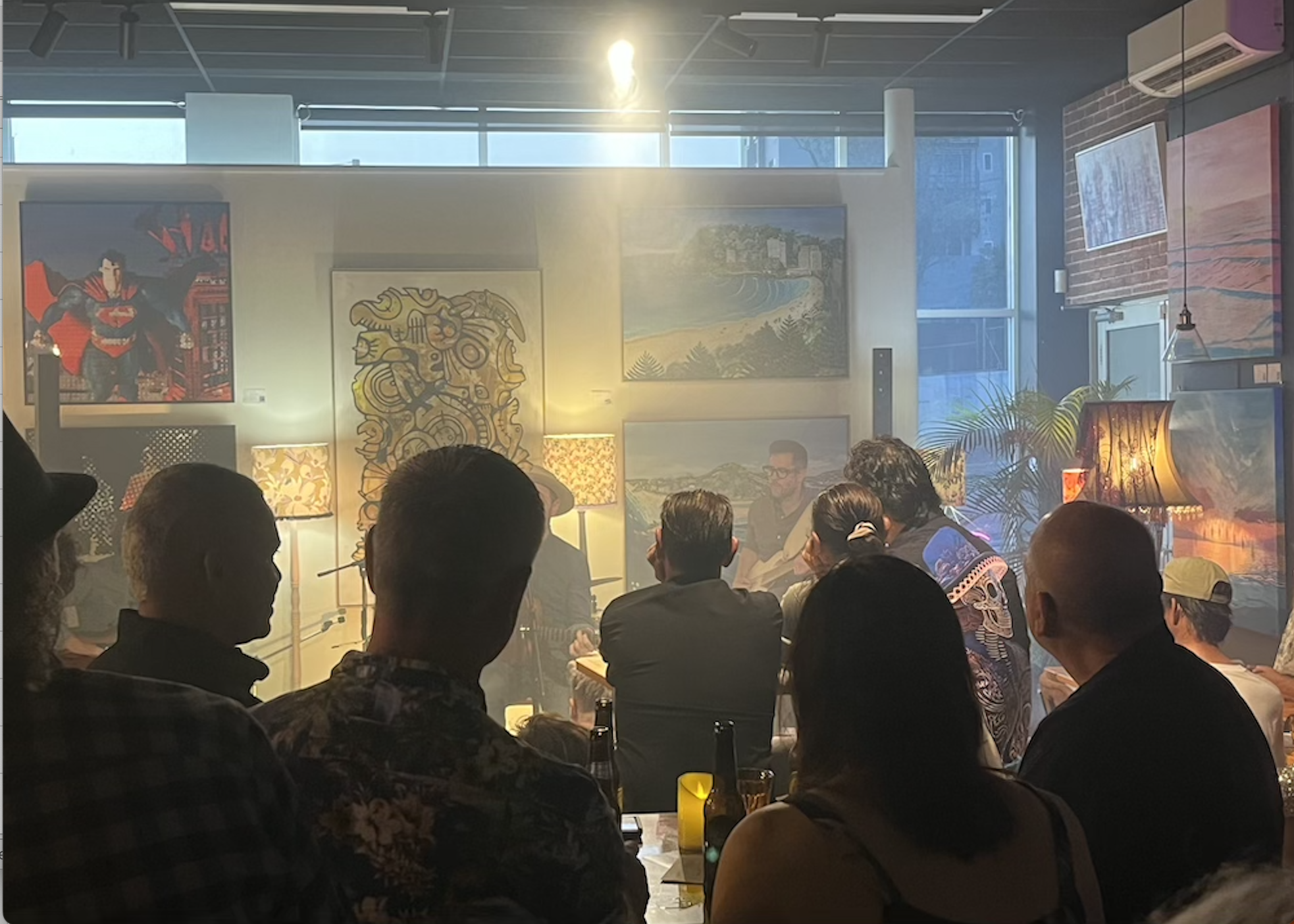 An intimate contemporary art venue in Southport, Gallery 8 hosts exhibitions, live music, performances, and creative events in a warm, close-up gallery setting.