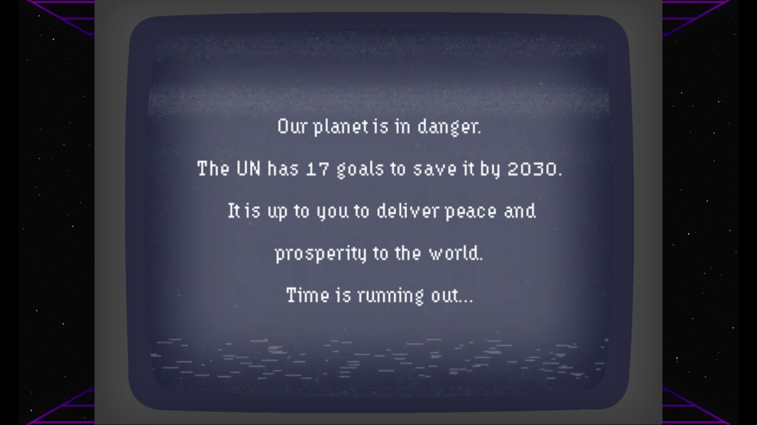 A digital screen with a message about environmental danger and global goals. The background appears space-themed with small pink and purple dots and neon grid lines on the edges. The message reads: "Our planet is in danger. The UN has 17 goals to sav