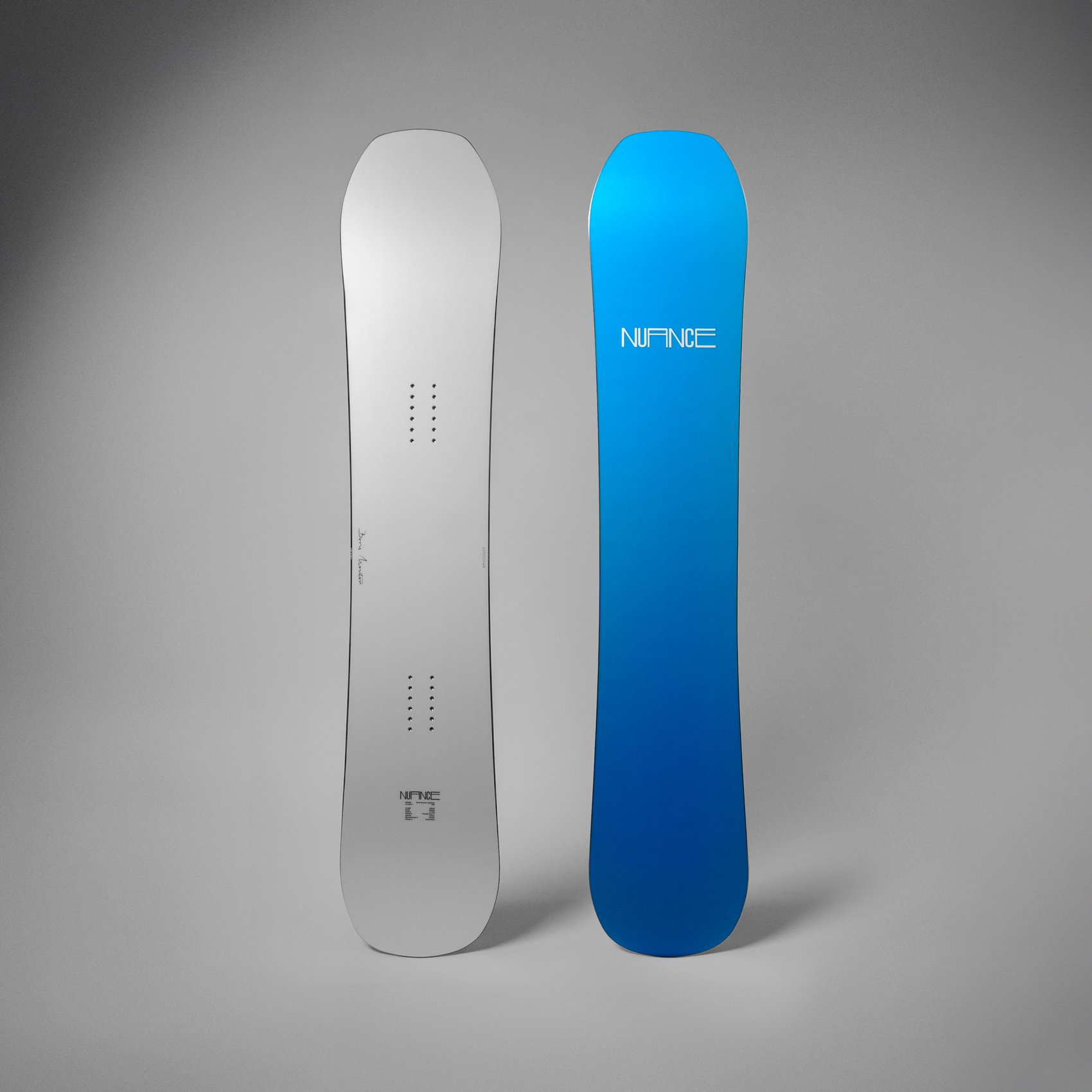 Boris Mouton signature snowboard, front packshot with white topsheet and back packshot with blue sole and white logo.