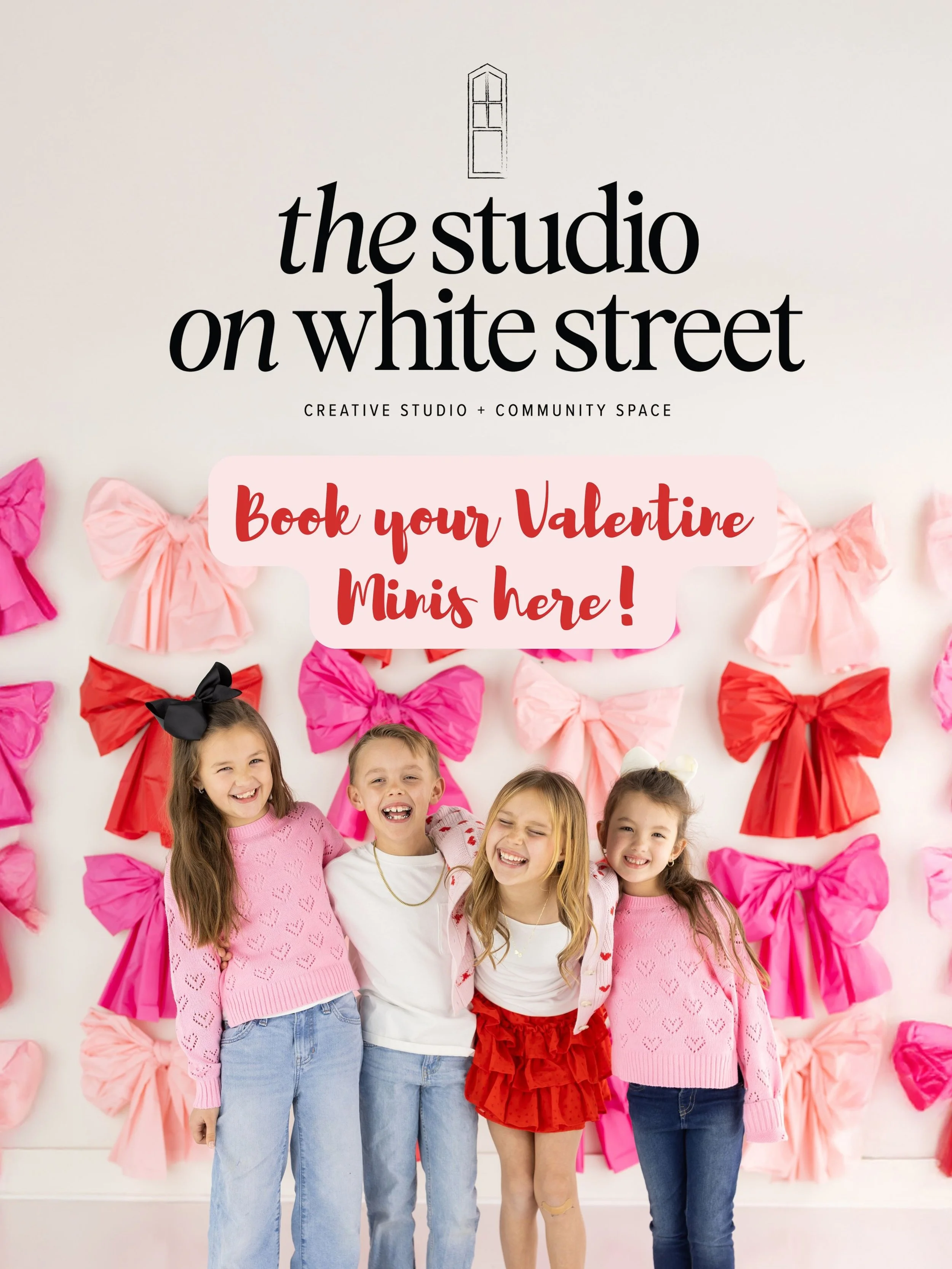 Group of siblings taking valentines pictures in front of bow wall that is the backdrop. Now colors are red pink and hot pink. girls are wearing pink, red and denim and boys are wearing white shirt and jeans. best studio in northwest Arkansas for pics