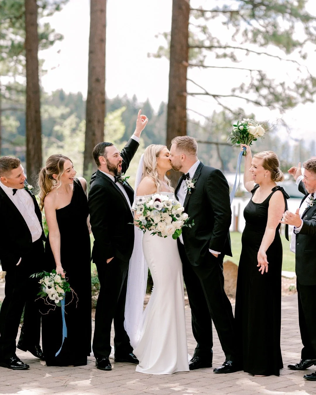 Nothing says &ldquo;we did it&rdquo; like a wedding party cheering you on in style. With those classic tuxes, elegant bouquets, and major smiles all around, this crew nailed the vibe. ✨

Planner: @marcellacamilleevents
Photography: @samikathryn
Venue
