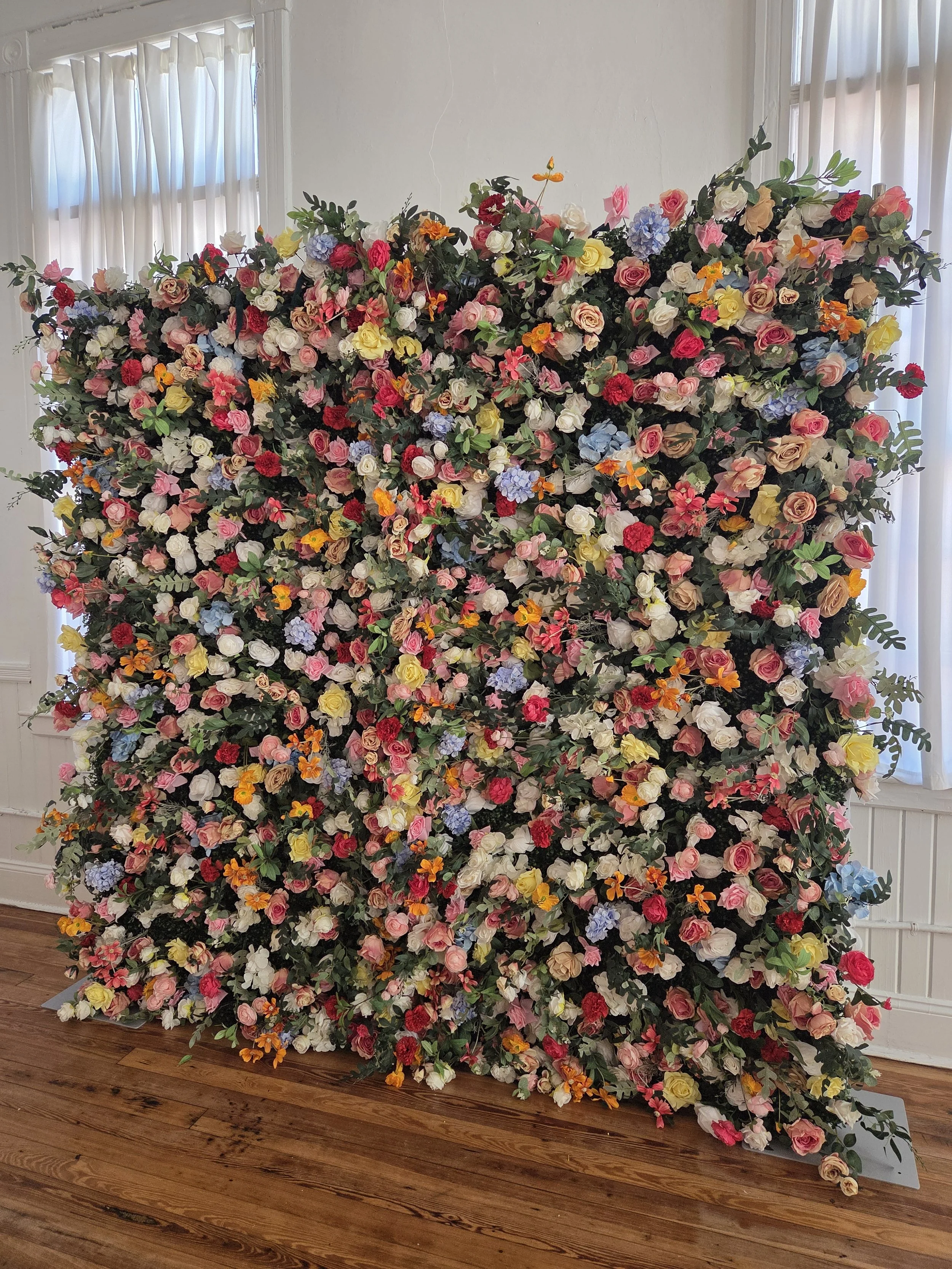 Colorful spring flower wall backdrop rental party decorations