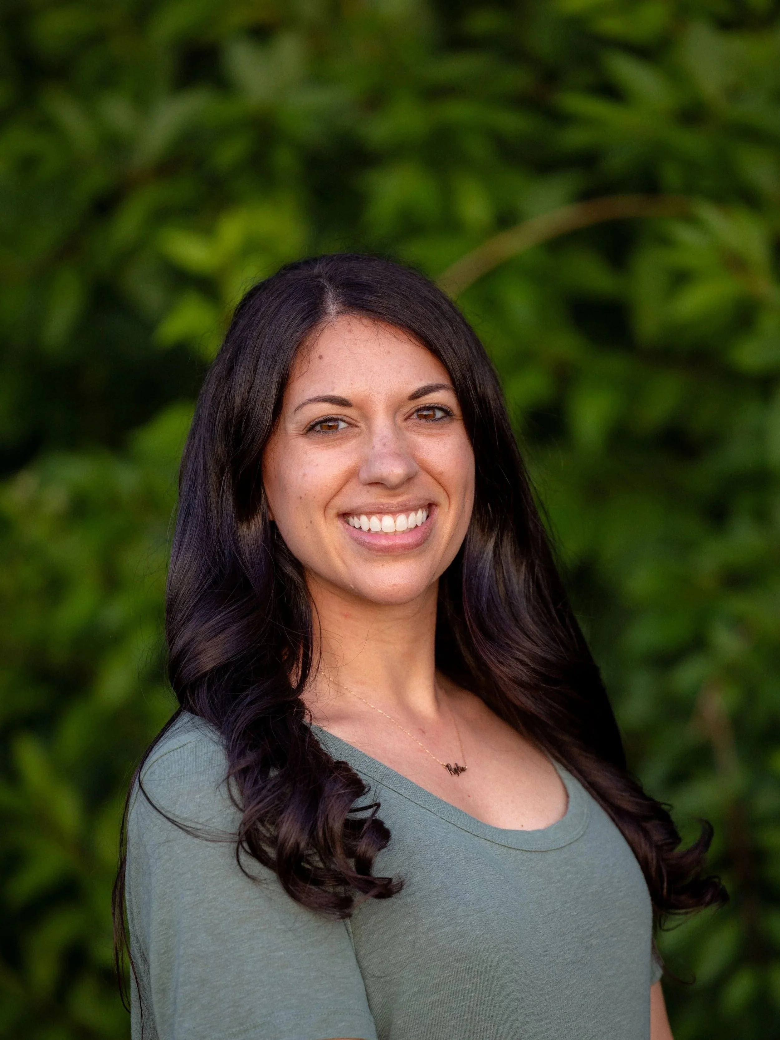 Portrait of Michelle Durkin, Founder of Rise Above LLC.