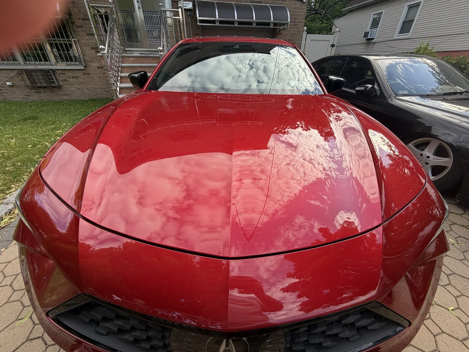 Red muscle car hood after exterior detail Westchester County