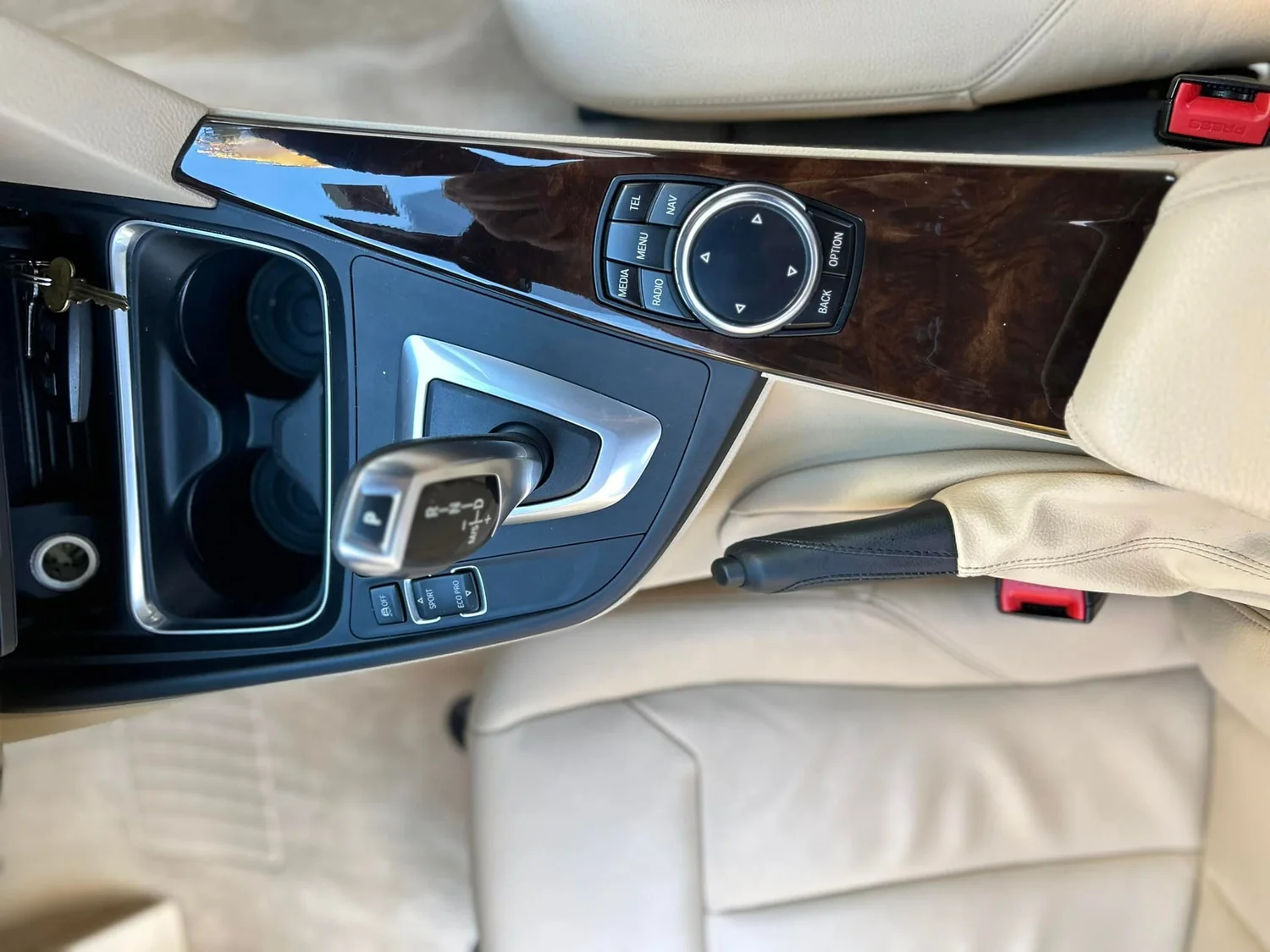 Interior console cleaned and detailed during Full Essentials service