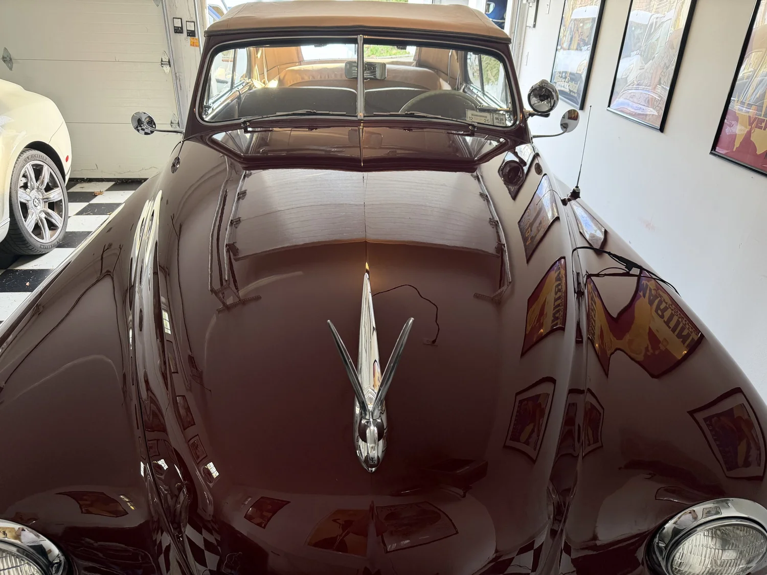 Deep brown vintage convertible with mirror gloss finish detailed in Greenwich CT