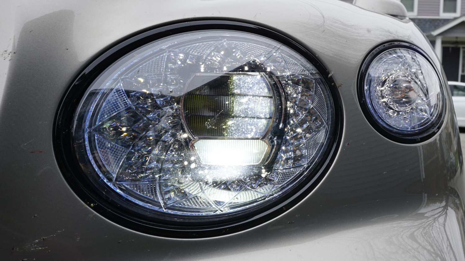 Large complex headlight assembly on a truck or SUV requiring complicated restoration