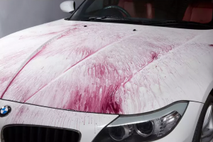 Iron decontamination spray reacting purple with brake dust embedded in paint
