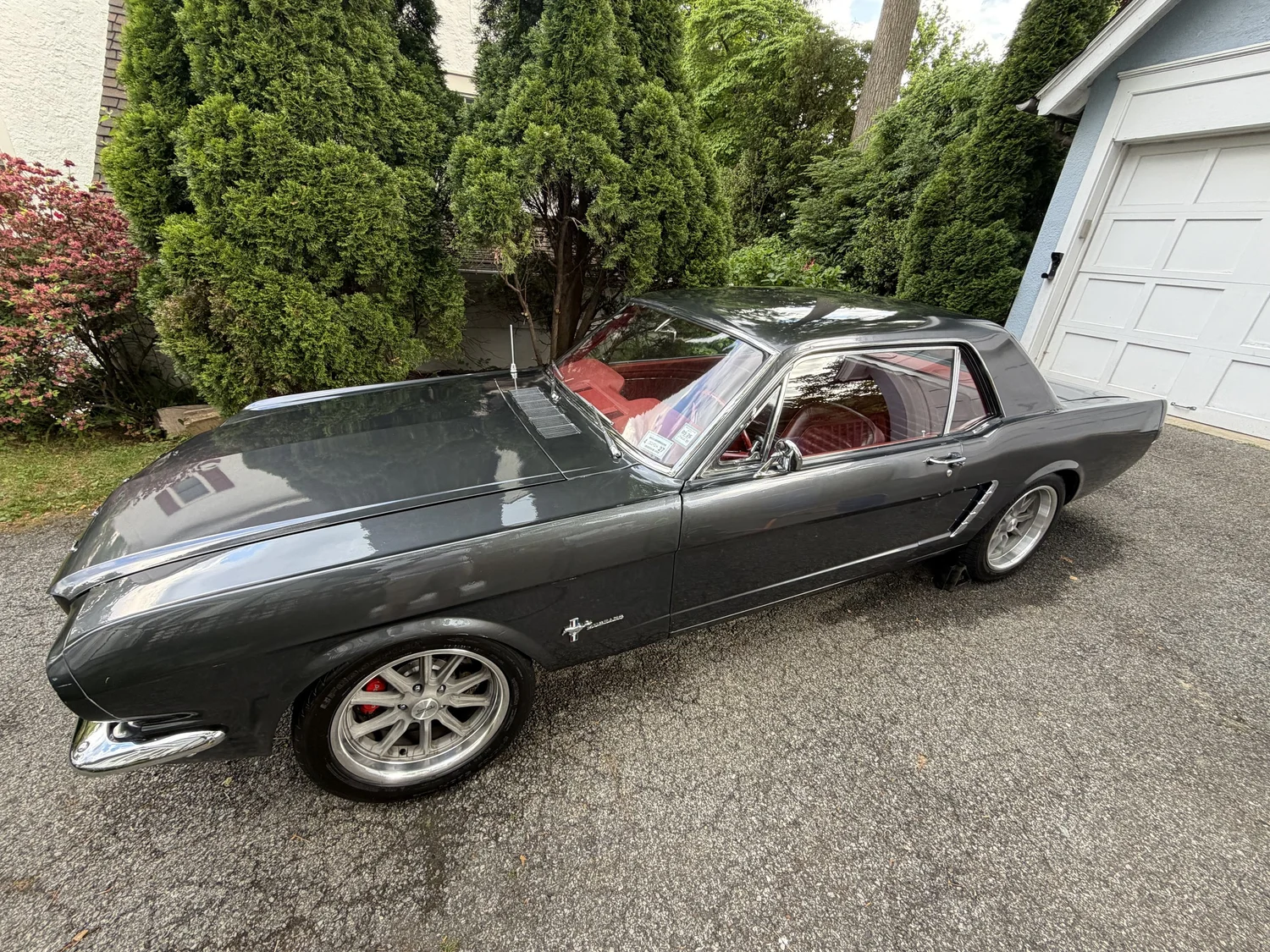 Classic Ford Mustang detailed by Tedrow's Mobile Detailing in a customer's driveway in Westchester County New York