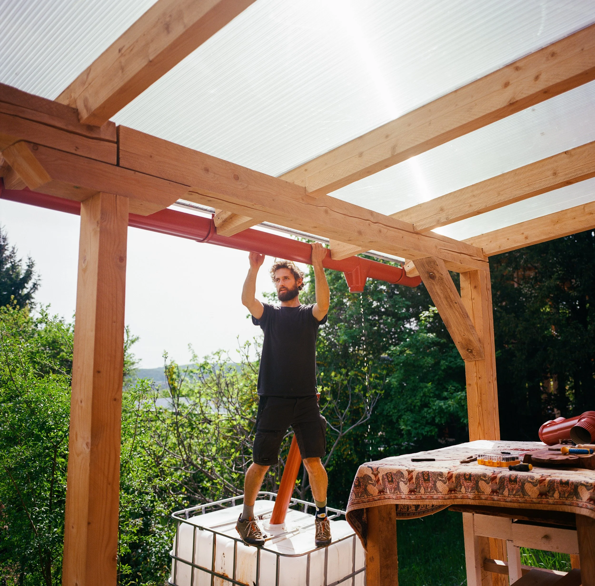 Person installing rainwater collection