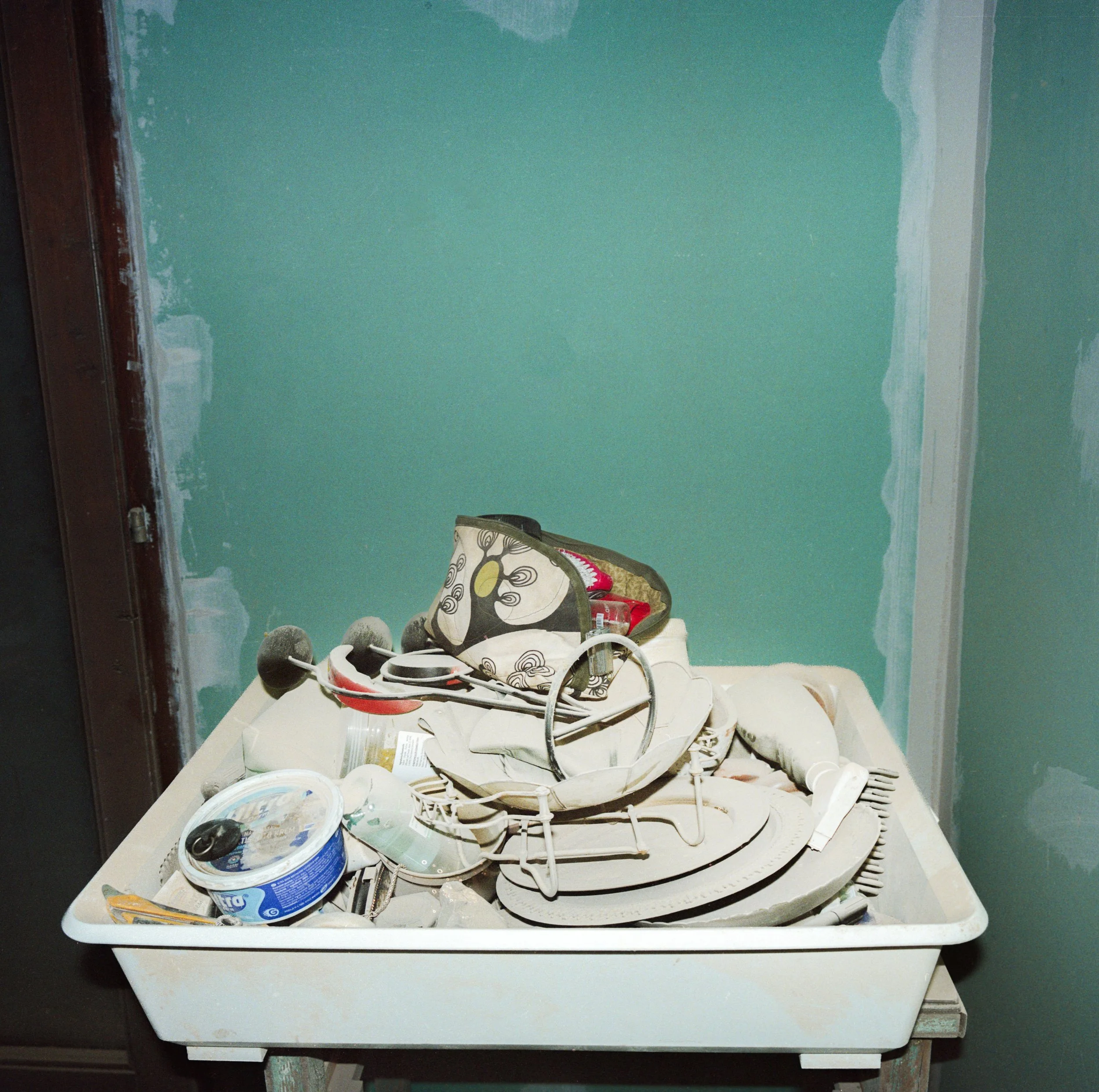 Dusty pile of dishes inside farm home