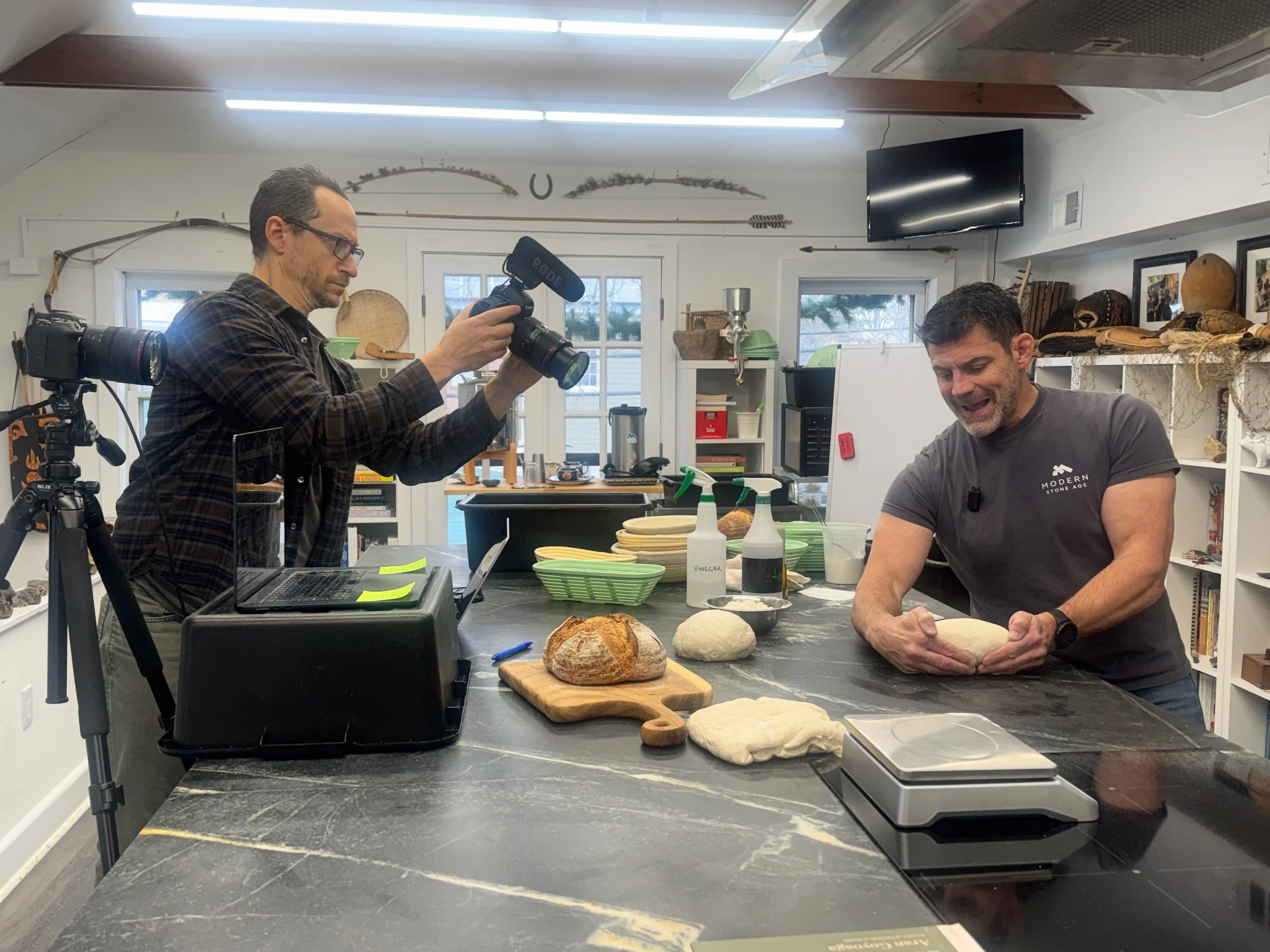 Shane filming Bill during an Ancestral Table class on Sourdough Shaping