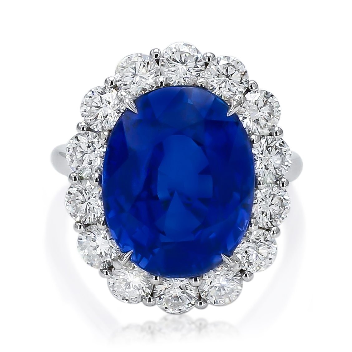 sapphire with diamond halo engagement ring