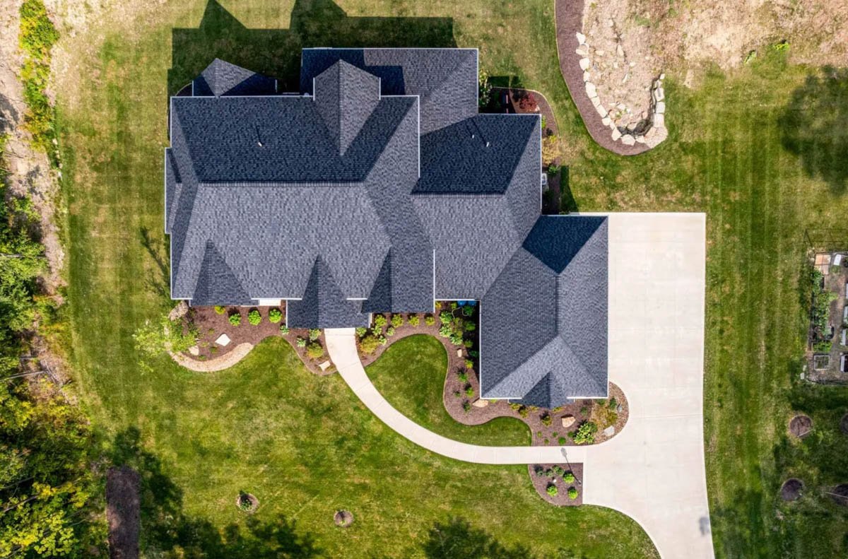 Aerial view of a custom home on a large residential lot in Northeast Ohio