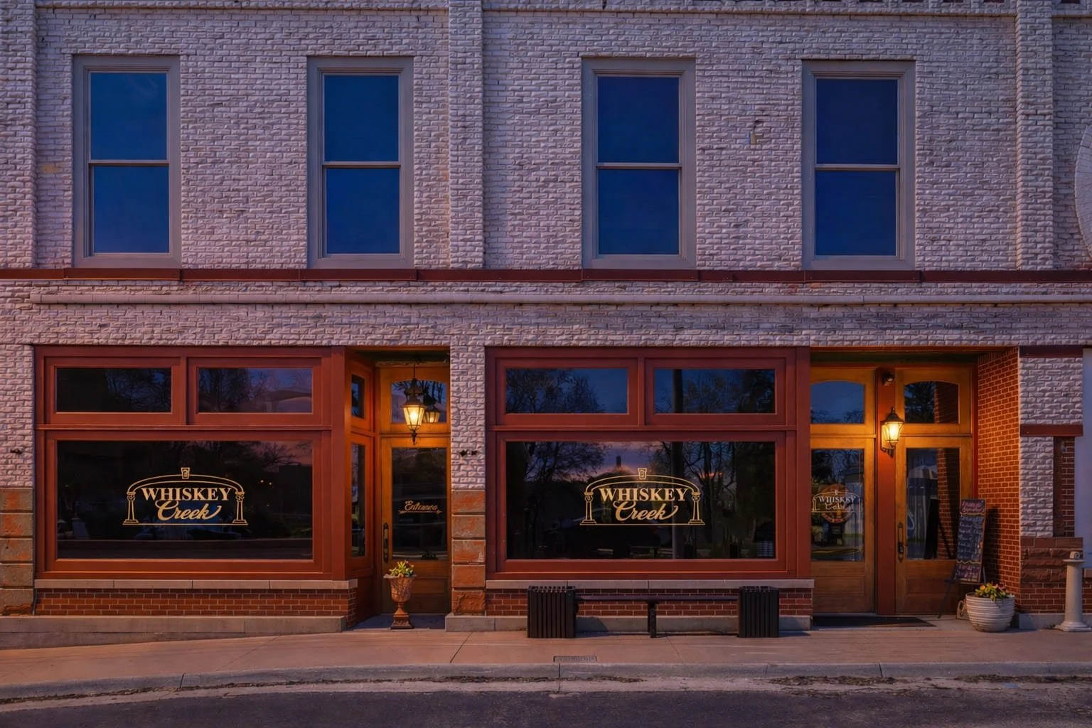 A nightime view of the outside of Whiskey Creek.