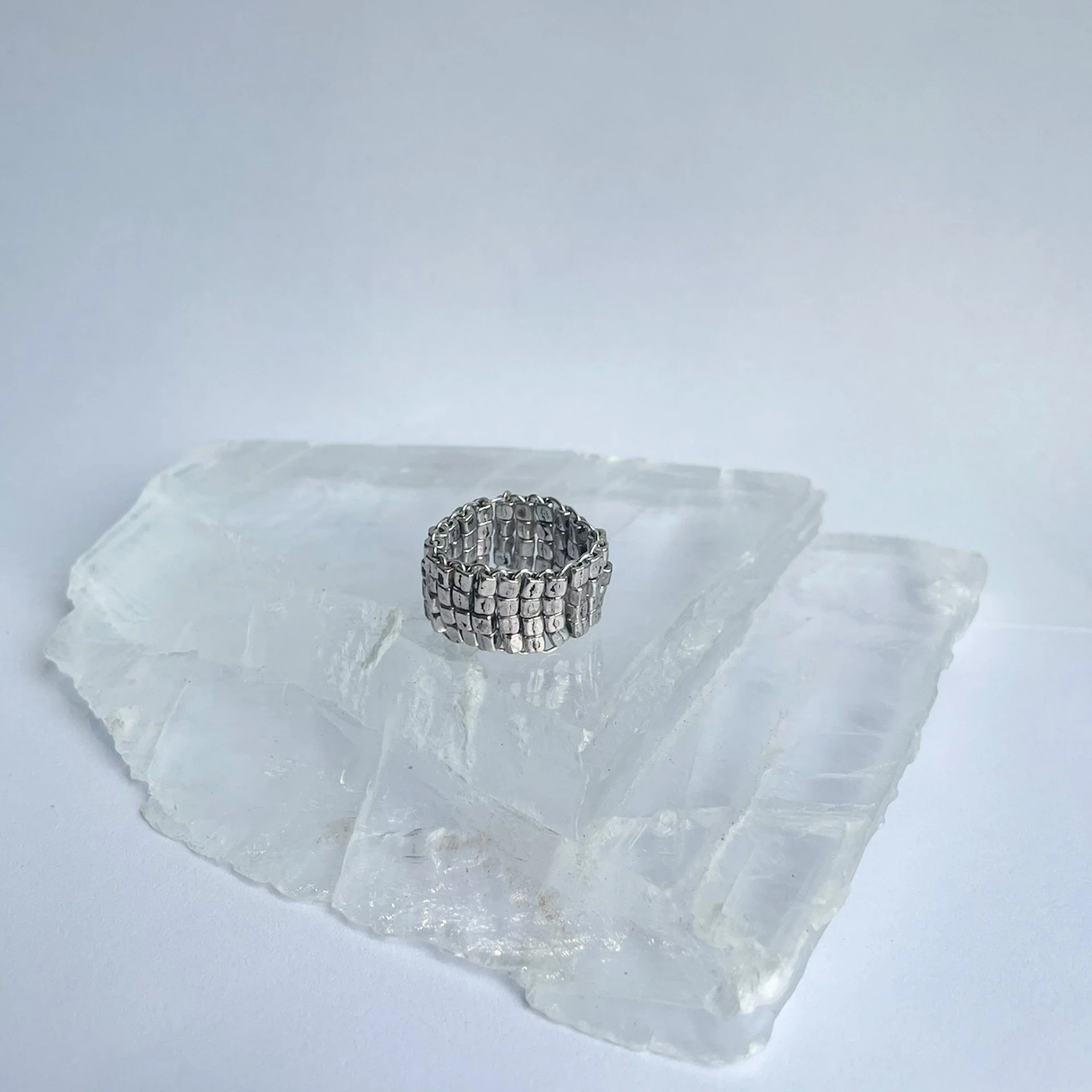 Multilevel silver beaded ring staged.jpg
