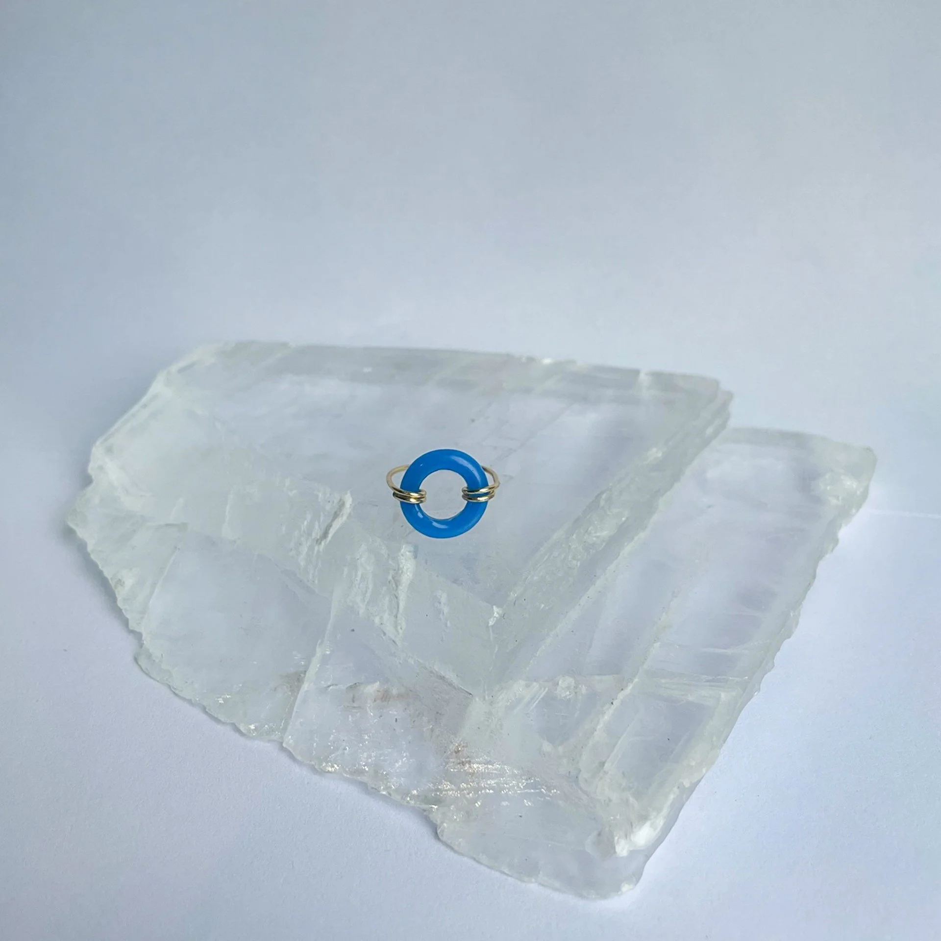 Blue circle Gold wire ring staged.jpg