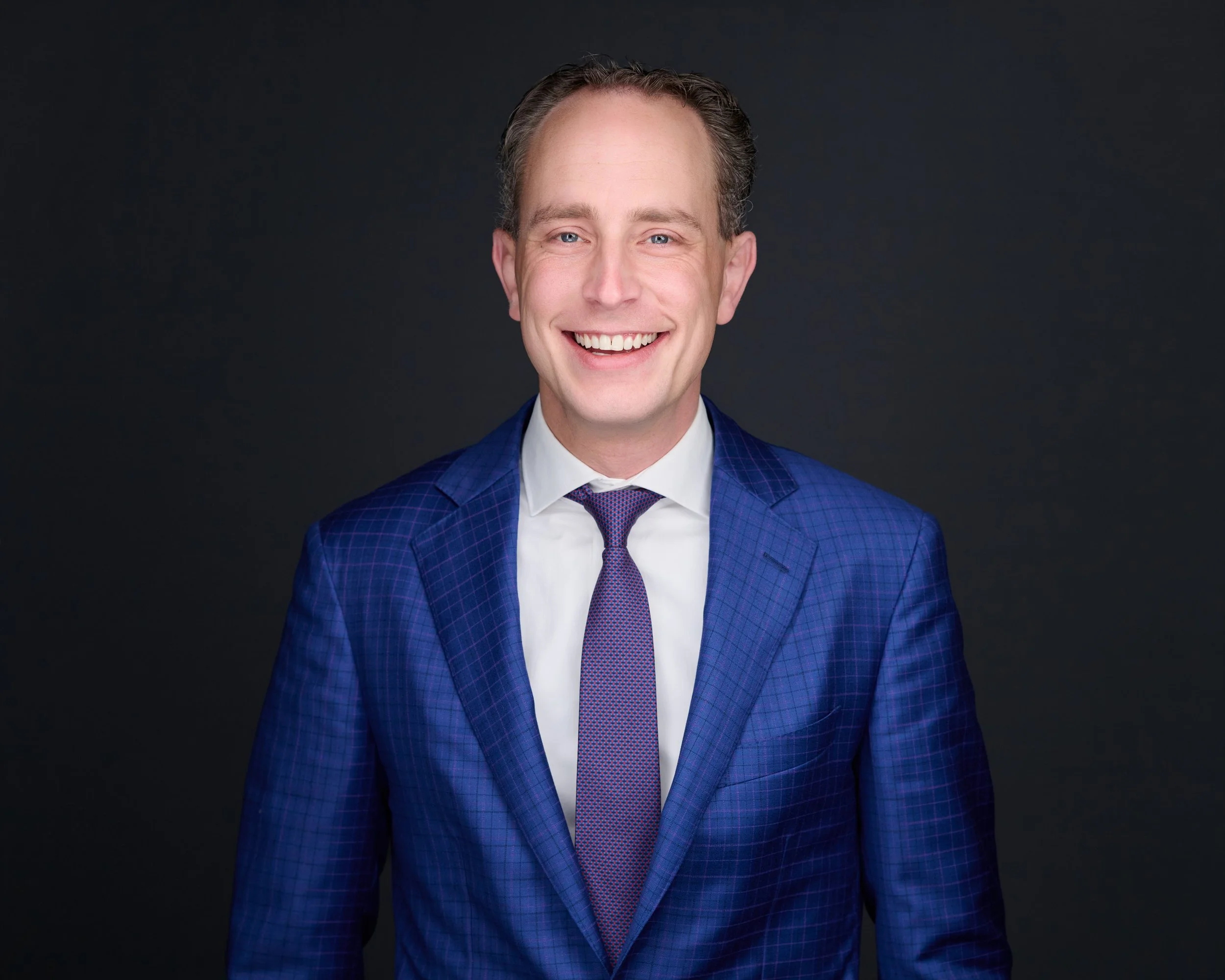 Profielfoto met mobiele studio op locatie