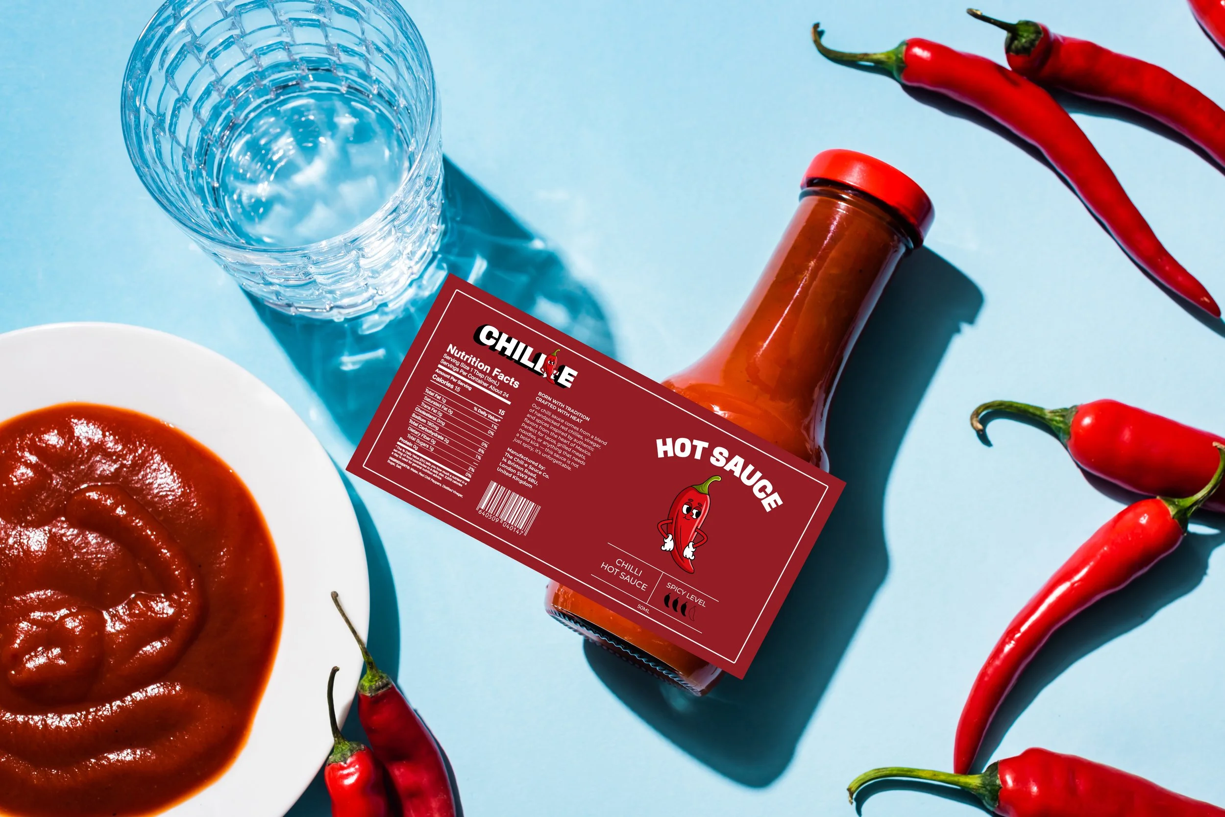 top-view-of-chili-sauce-in-bottle-and-plate-with-c-2024-11-10-23-00-22-utc.jpg