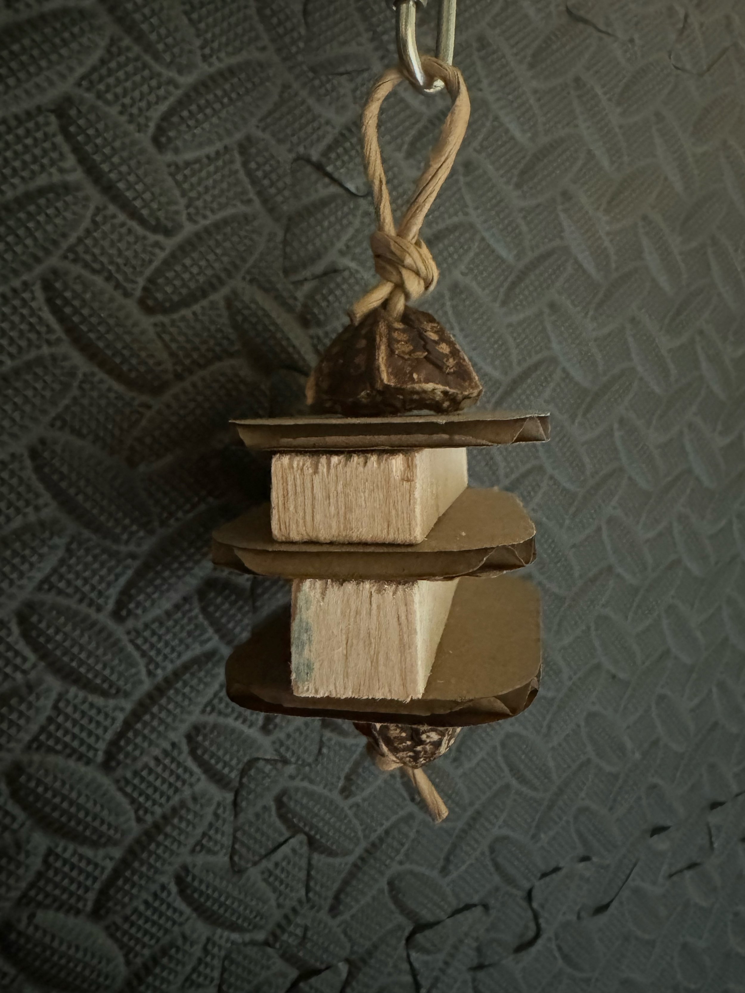small natural bird toy made of balsa wood and cardboard